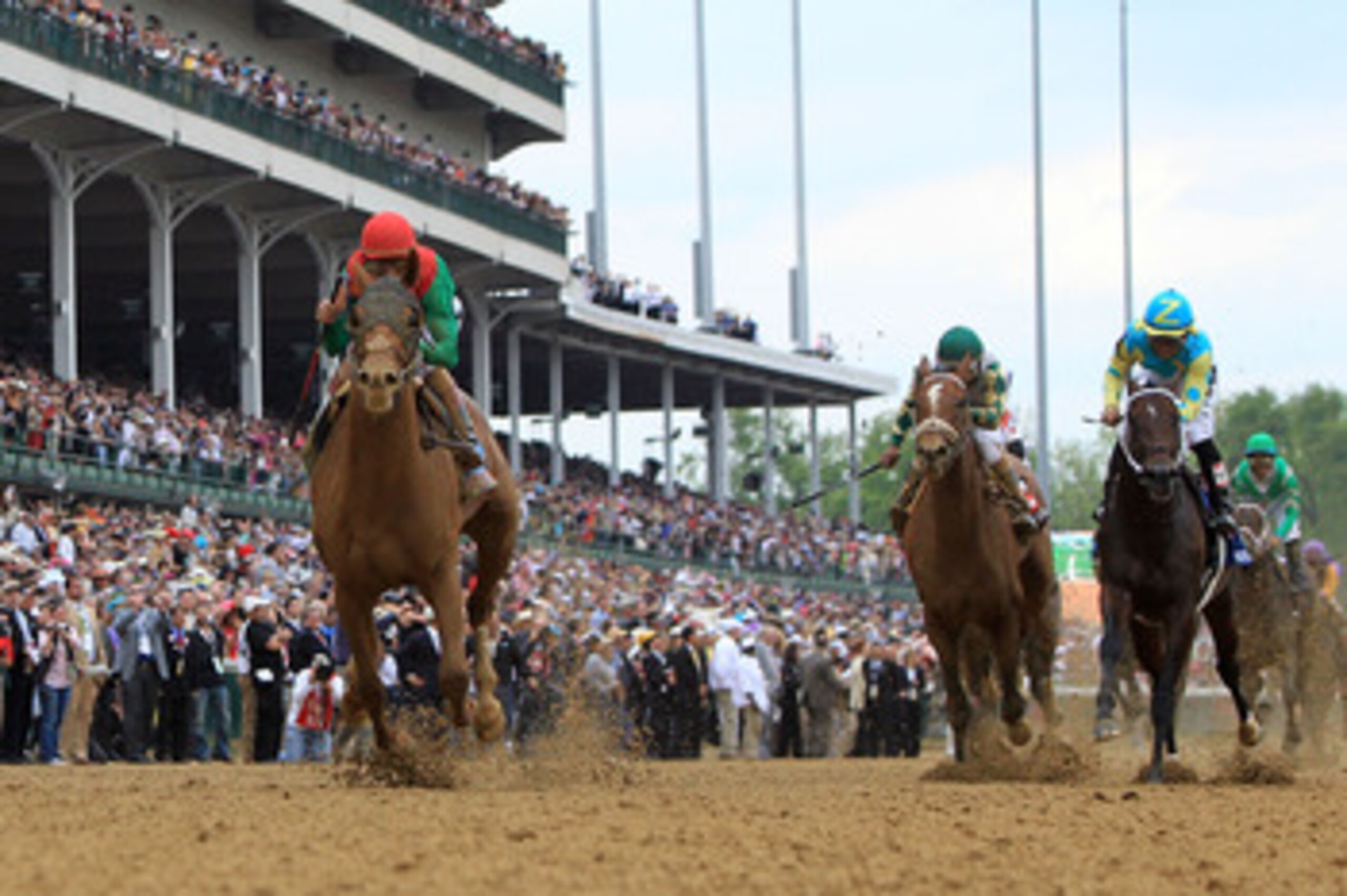 LOUISVILLE, KY - MAY 07:  Jockey John Velazquez, riding Animal Kingdom #16, runs down the front stretch towards the finish line to win the 137th Kentucky Derby at Churchill Downs on May 7, 2011 in Louisville, Kentucky.  (Photo by Matthew Stockman/Getty Im