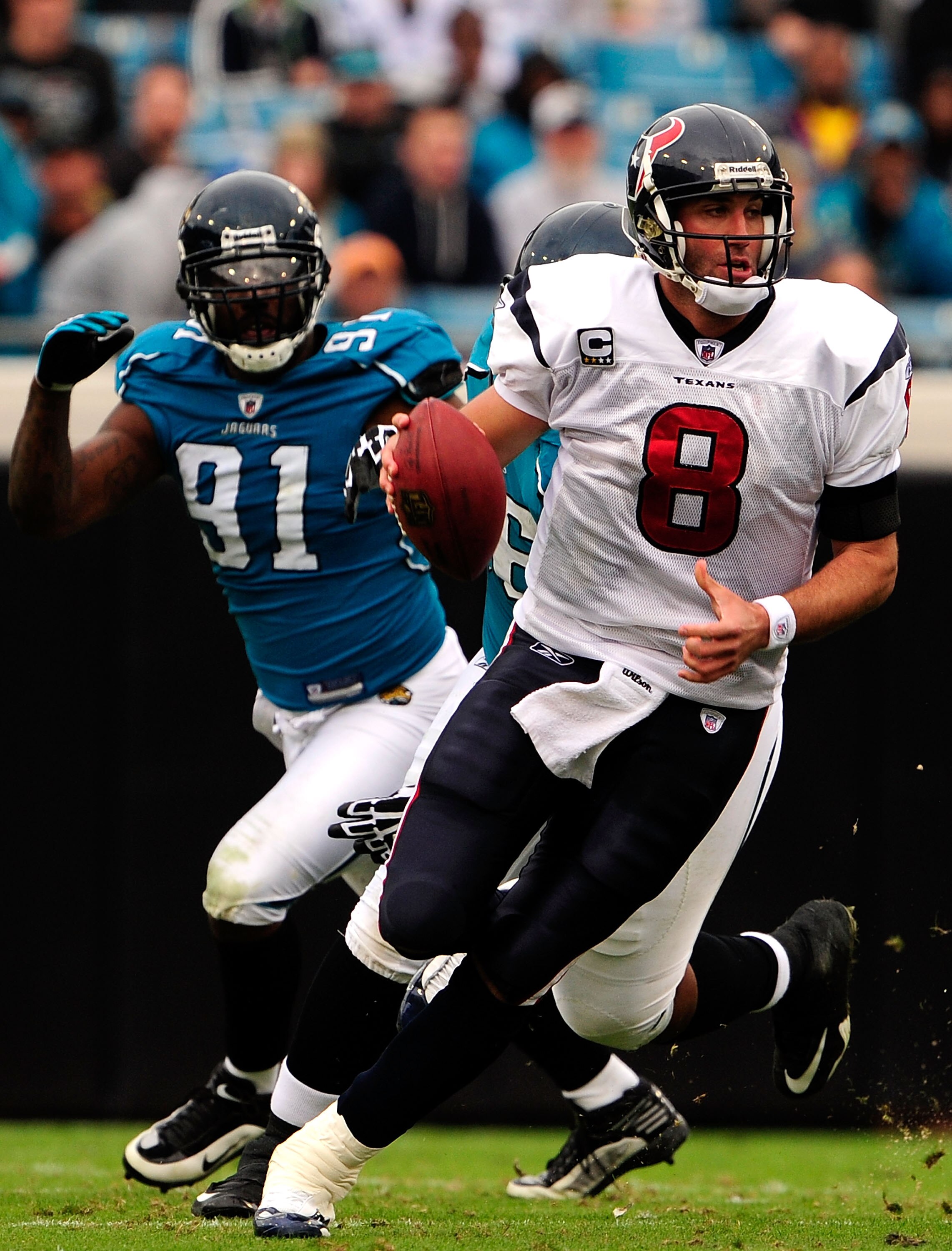 JACKSONVILLE, FL - DECEMBER 06:  Derrick Harvey #91 of the Jacksonville Jaguars pressures Matt Schaub #8 of the Houston Texnas during the game at Jacksonville Municipal Stadium on December 6, 2009 in Jacksonville, Florida.  (Photo by Sam Greenwood/Getty I