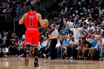 ATLANTA, GA - MAY 06:  Derrick Rose #1 of the Chicago Bulls runs the ball up the court against the Atlanta Hawks in Game Three of the Eastern Conference Semifinals in the 2011 NBA Playoffs at Phillips Arena on May 6, 2011 in Atlanta, Georgia.  NOTE TO USE