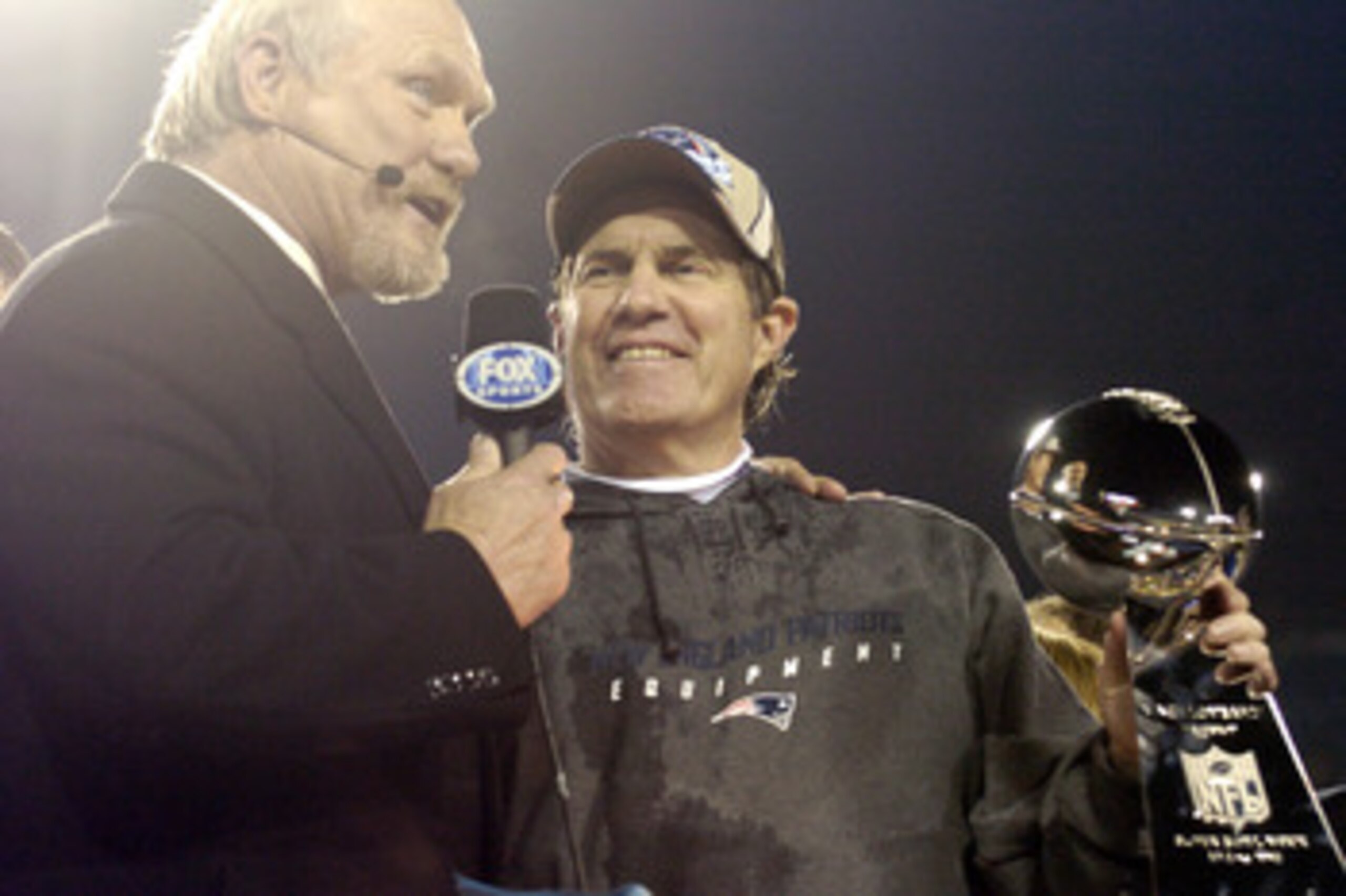 New England Patriots Head Coach Bill Belichick holds The Vince Lombardi Trophy after the Patriots won Super Bowl XXXIX at Alltel Stadium in Jacksonville, Florida on February 6, 2005. (Photo by Al Messerschmidt/Getty Images) New England Patriots Head Coach Bill Belichick holds The Vince Lombardi Trophy after the Patriots won Super Bowl XXXIX at Alltel Stadium in Jacksonville, Florida on February 6, 2005. (Photo by Al Messerschmidt/Getty Images)