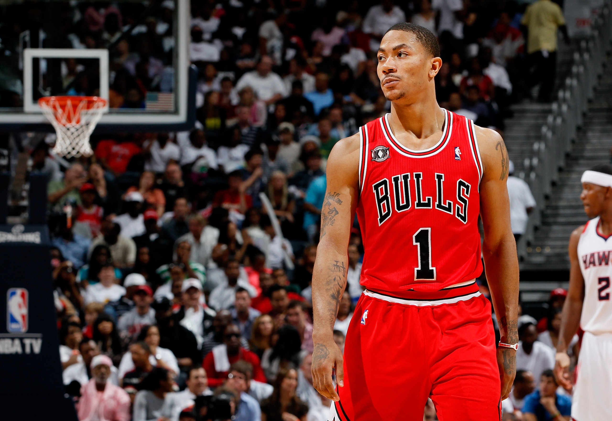 ATLANTA, GA - MAY 06: Derrick Rose #1 of the Chicago Bulls walks down court after scoring against the Atlanta Hawks in Game Three of the Eastern Conference Semifinals in the 2011 NBA Playoffs at Phillips Arena on May 6, 2011 in Atlanta, Georgia. NOTE TO ATLANTA, GA - MAY 06: Derrick Rose #1 of the Chicago Bulls walks down court after scoring against the Atlanta Hawks in Game Three of the Eastern Conference Semifinals in the 2011 NBA Playoffs at Phillips Arena on May 6, 2011 in Atlanta, Georgia. NOTE TO