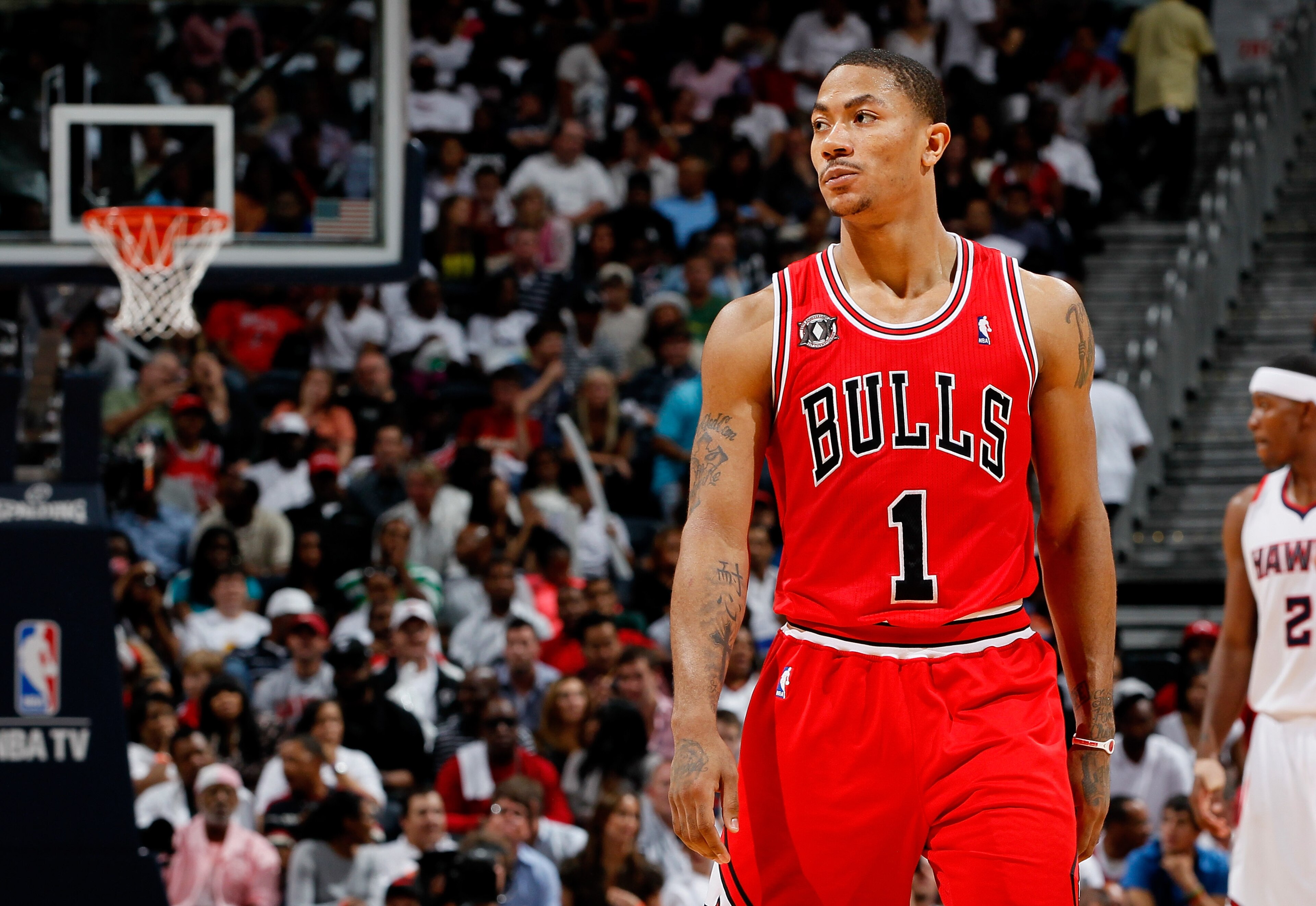 ATLANTA, GA - MAY 06: Derrick Rose #1 of the Chicago Bulls walks down court after scoring against the Atlanta Hawks in Game Three of the Eastern Conference Semifinals in the 2011 NBA Playoffs at Phillips Arena on May 6, 2011 in Atlanta, Georgia. NOTE TO ATLANTA, GA - MAY 06: Derrick Rose #1 of the Chicago Bulls walks down court after scoring against the Atlanta Hawks in Game Three of the Eastern Conference Semifinals in the 2011 NBA Playoffs at Phillips Arena on May 6, 2011 in Atlanta, Georgia. NOTE TO