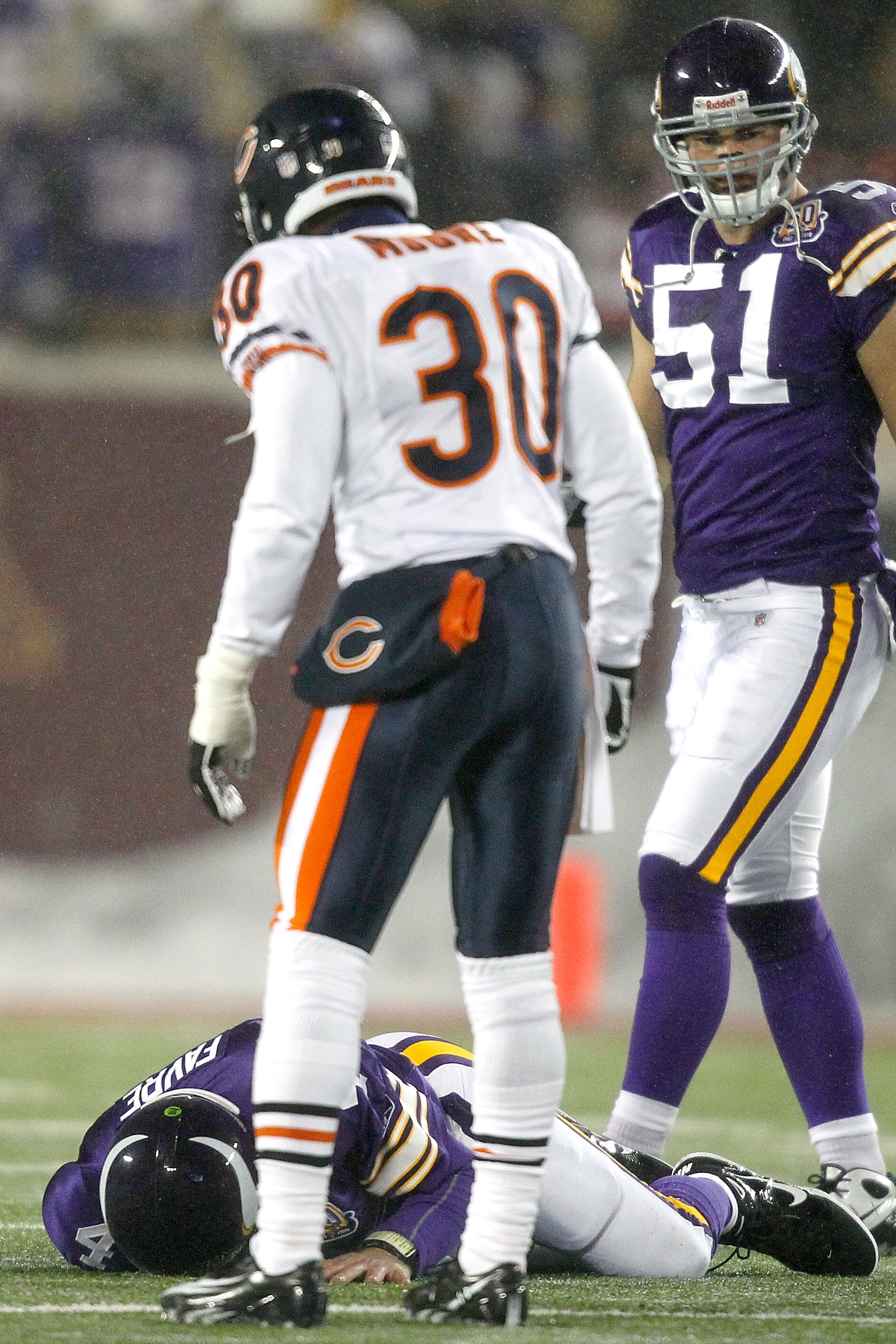 MINNEAPOLIS, MN - DECEMBER 20:  Quarterback Brett Favre #4 of the Minnesota Vikings is sacked by the Chicago Bears at TCF Bank Stadium on December 20, 2010 in Minneapolis, Minnesota.  (Photo by Matthew Stockman/Getty Images)