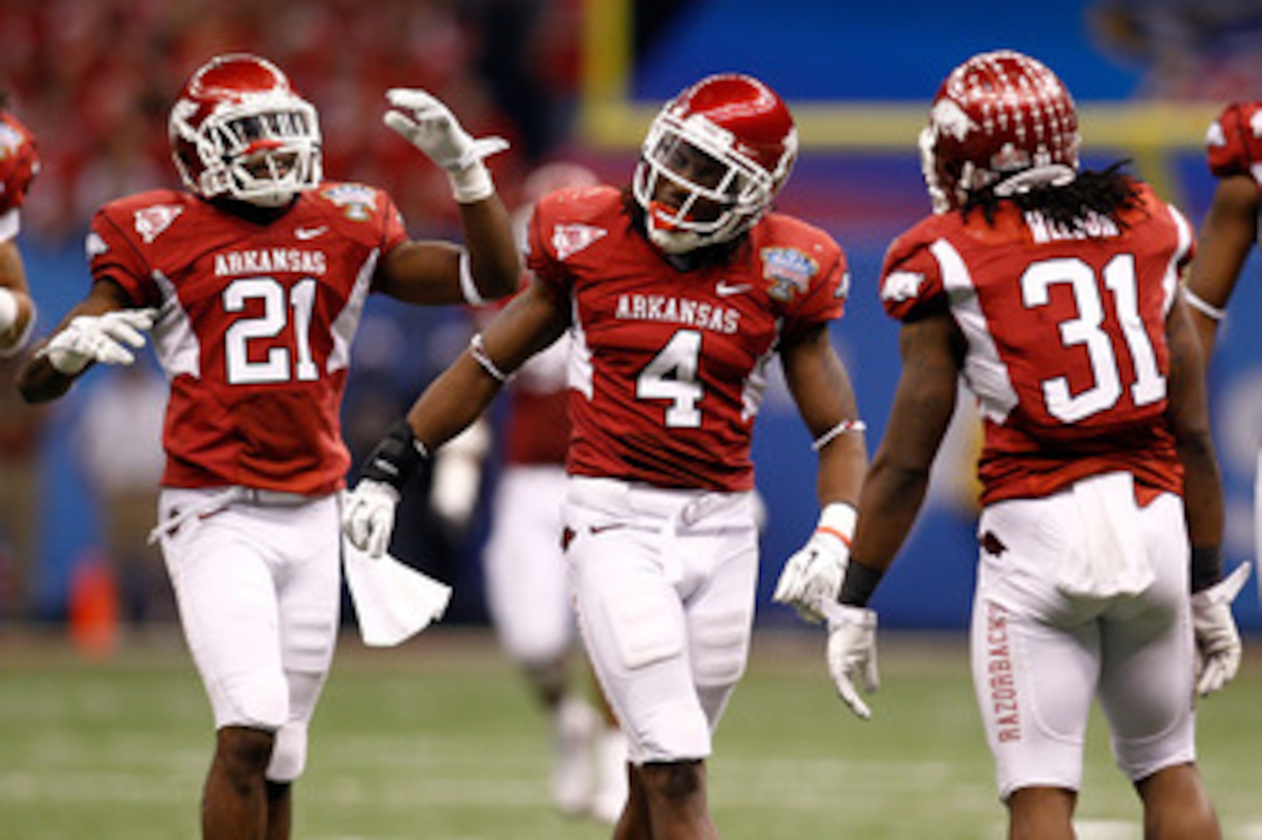 NEW ORLEANS, LA - JANUARY 04:  Rudell Crim #4 of the Arkansas Razorbacks reacts to missing an interception in the third quarter against the Ohio State Buckeyes during the Allstate Sugar Bowl at the Louisiana Superdome on January 4, 2011 in New Orleans, Lo