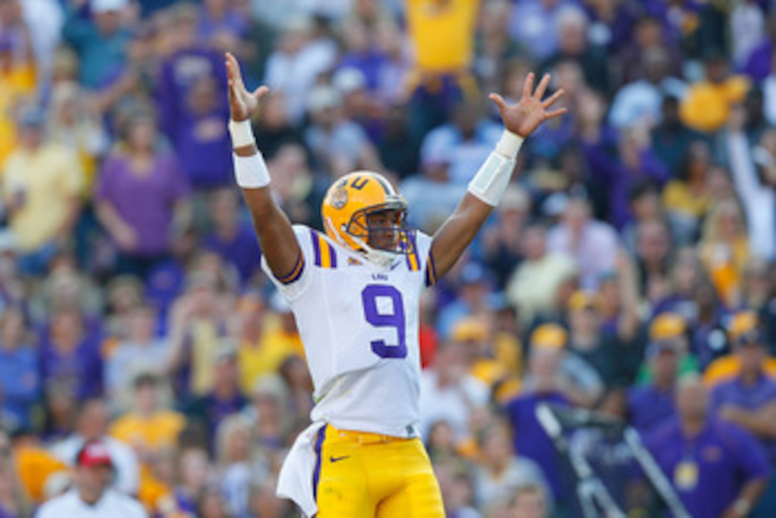 BATON ROUGE, LA - NOVEMBER 20:  Quarterback Jordan Jefferson #9 of the Louisiana State University Tigers reacts after scoring a touchdown against the Ole Miss Rebels at Tiger Stadium on November 20, 2010 in Baton Rouge, Louisiana.  (Photo by Kevin C. Cox/