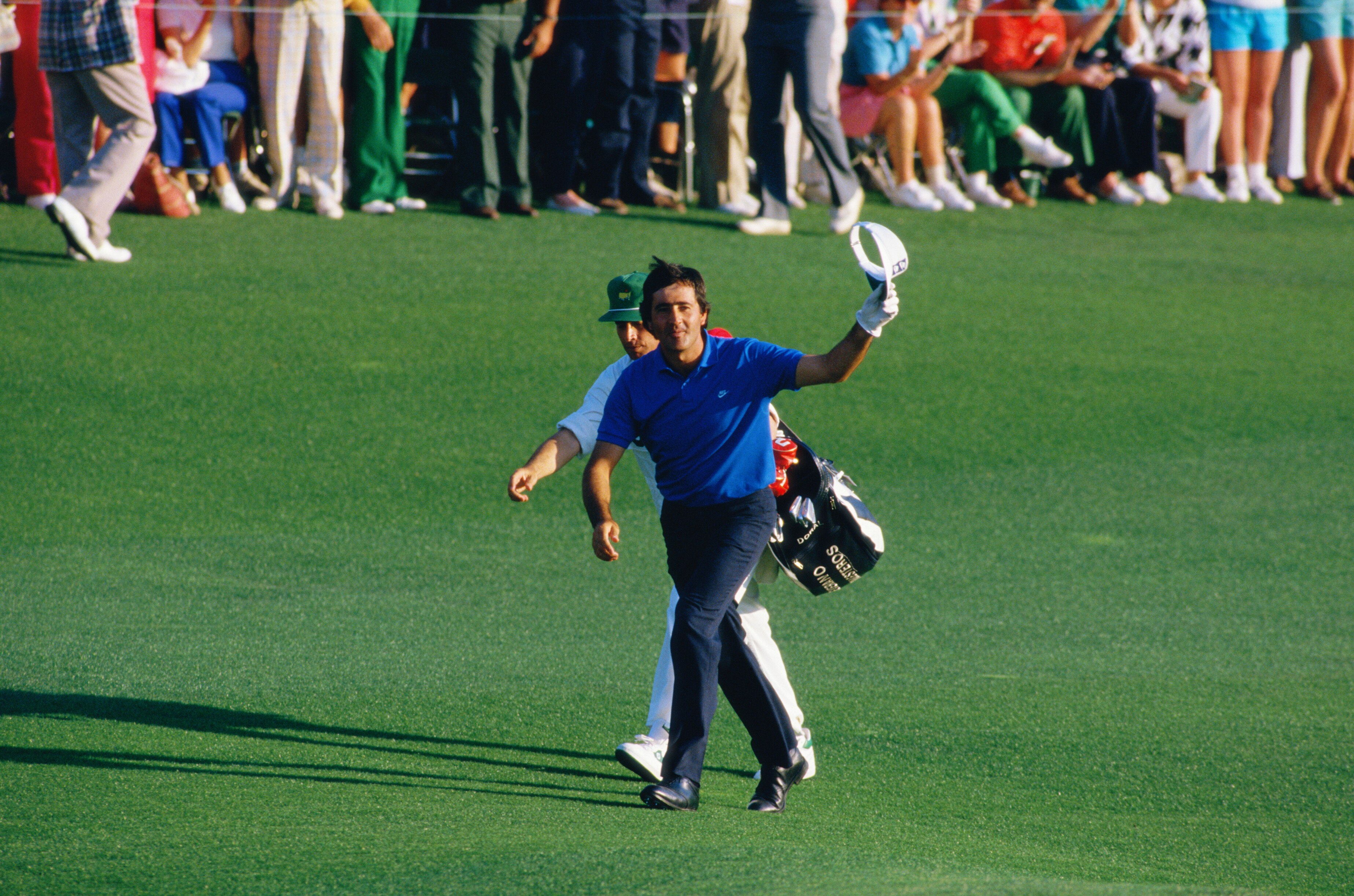 Spanish golfer Severiano Ballesteros walking up the 18th green at the Masters Tournament at Augusta National Golf Club, Georgia, USA, April 1986 (Photo by David Cannon/Getty Images)
