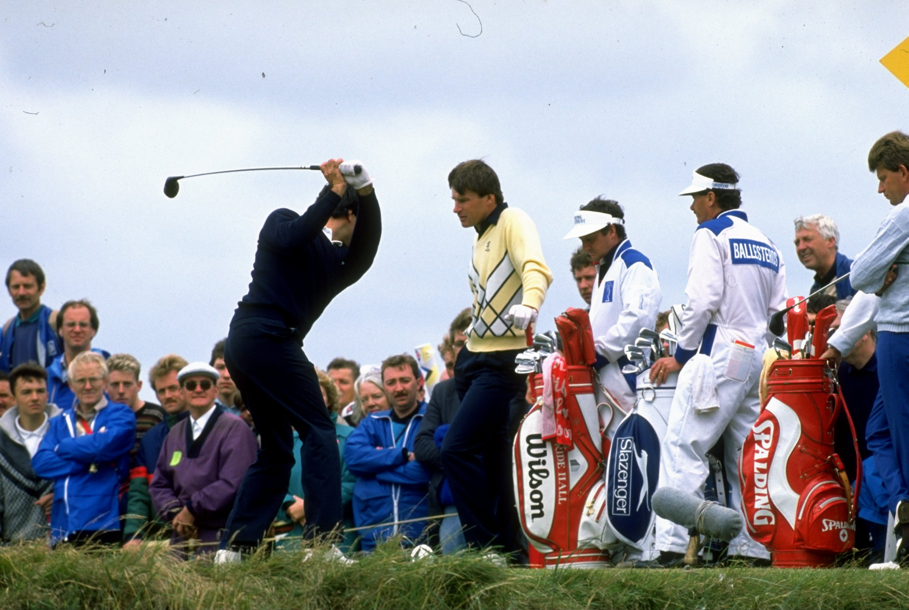 1988:  Seve Ballesteros of Spain in action watched by Nick Faldo of Great Britain during the British Open at the Royal Lytham Golf Club in Lancashire, England. Ballesteros won the event.  \ Mandatory Credit: David  Cannon/Allsport