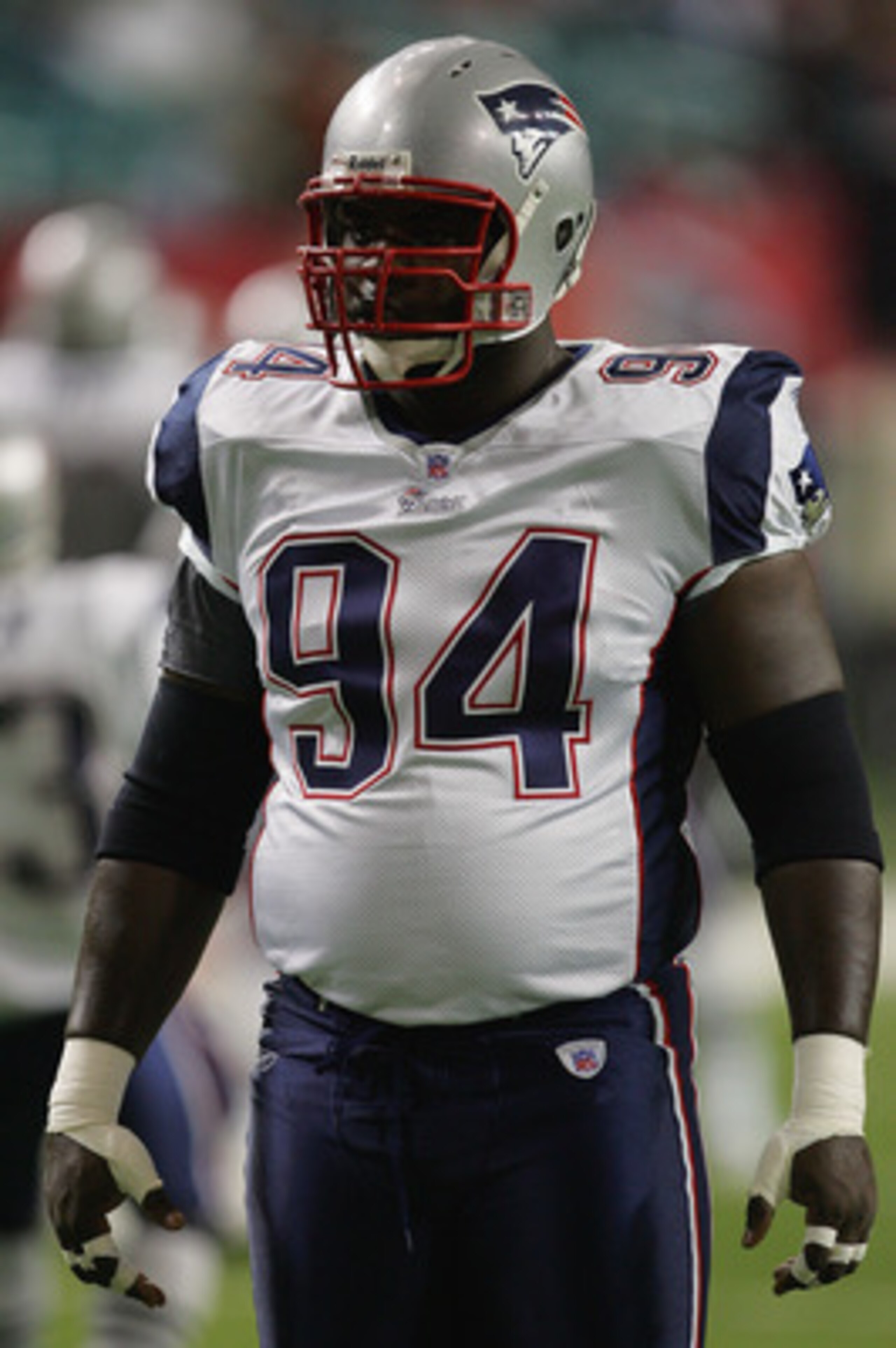 ATLANTA - AUGUST 11: Ty Warren #94 of the New England Patriots looks on during their NFL preseason game against the Atlanta Falcons on August 11, 2006 at the Georgia Dome in Atlanta, Georgia. (Photo By Streeter Lecka) ATLANTA - AUGUST 11: Ty Warren #94 of the New England Patriots looks on during their NFL preseason game against the Atlanta Falcons on August 11, 2006 at the Georgia Dome in Atlanta, Georgia. (Photo By Streeter Lecka)