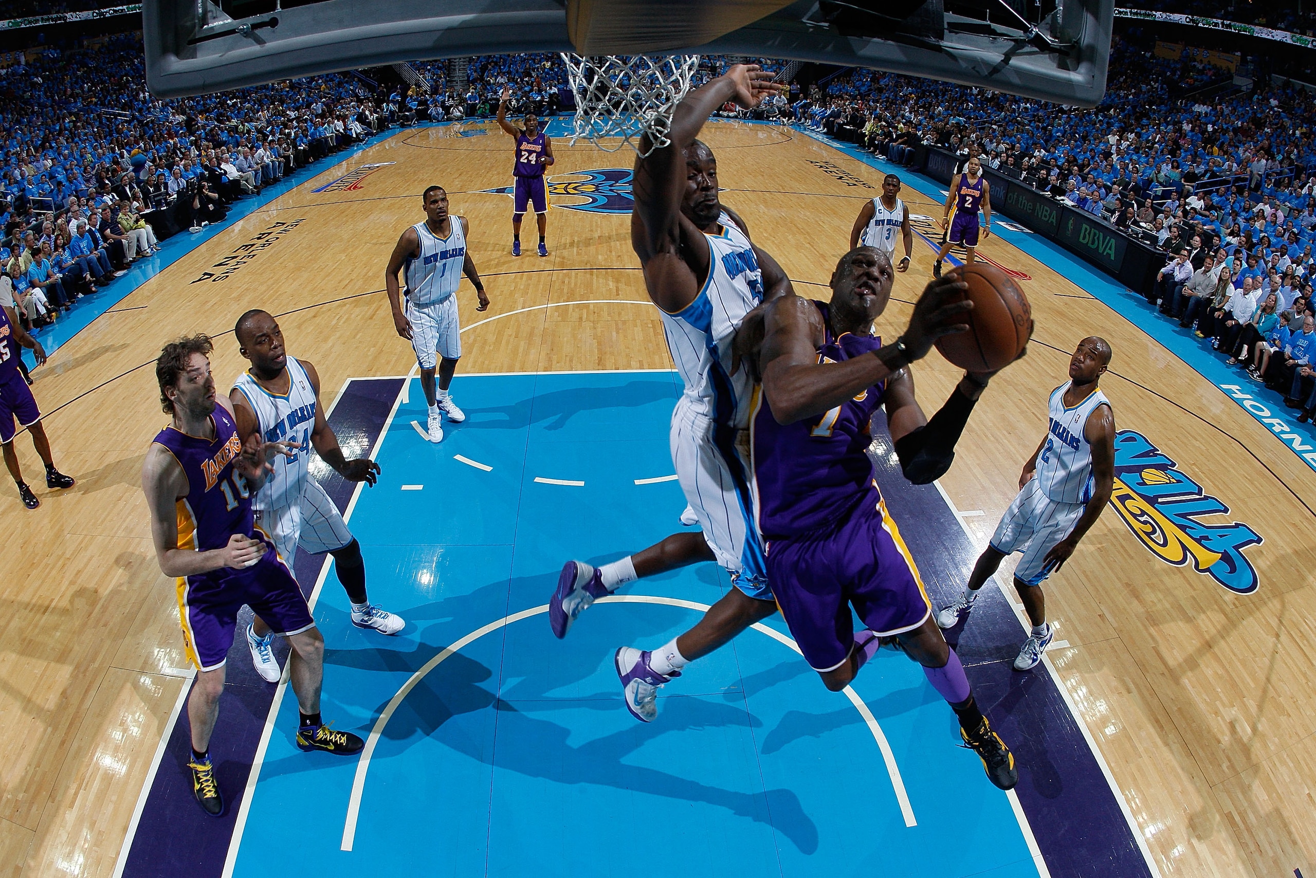 NEW ORLEANS, LA - APRIL 28:  Lamar Odom #7 of the Los Angeles Lakers takes a shot against Emeka Okafor #50 of the New Orleans Hornets in Game Six of the Western Conference Quarterfinals in the 2011 NBA Playoffs on April 28, 2011 at New Orleans Arena in Ne