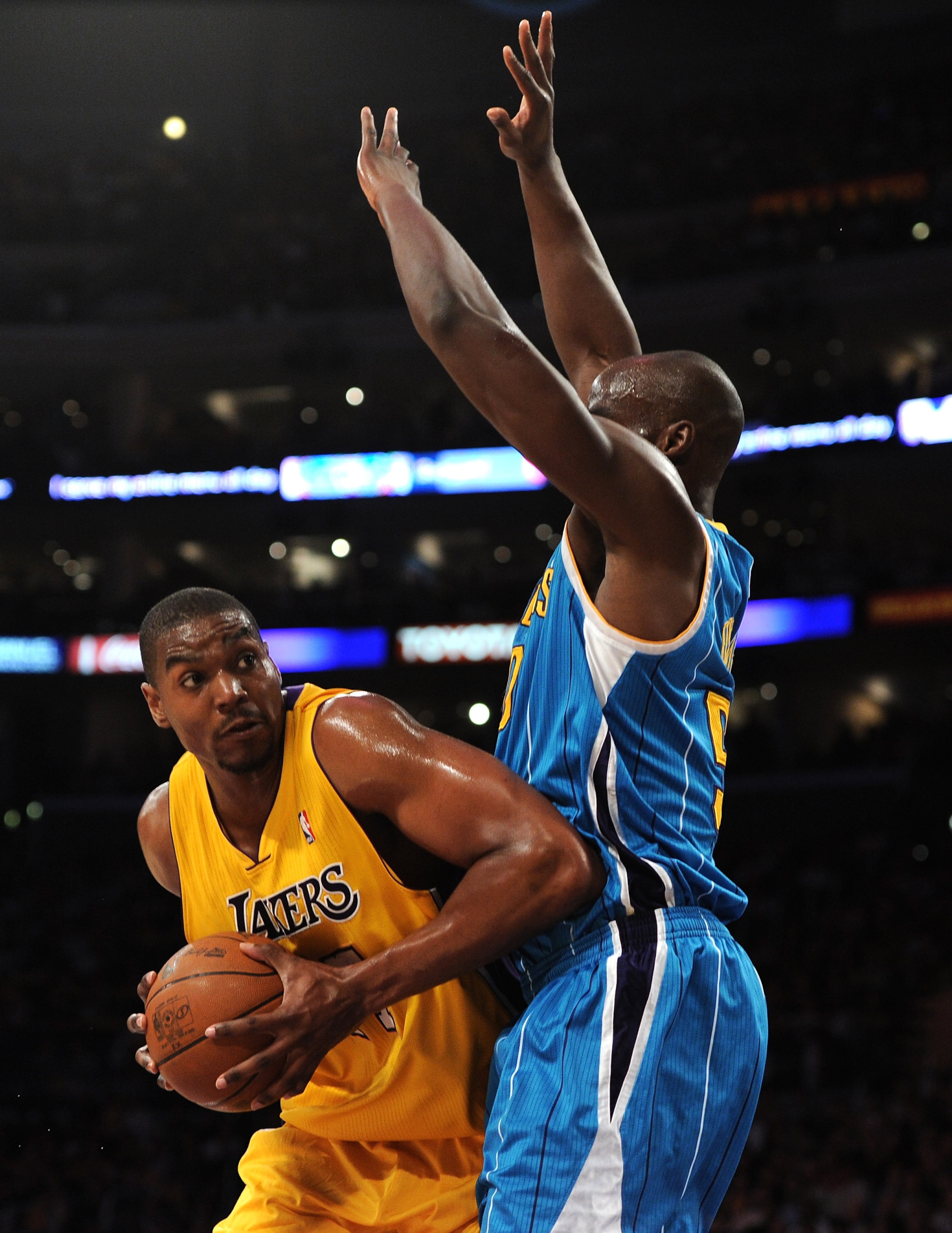 LOS ANGELES, CA - APRIL 26:  Andrew Bynum #17 of the Los Angeles Lakers looks to shoot over Emeka Okafor #50 of the New Orleans Hornets in the first quarter in Game Five of the Western Conference Quarterfinals in the 2011 NBA Playoffs on April 26, 2011 at