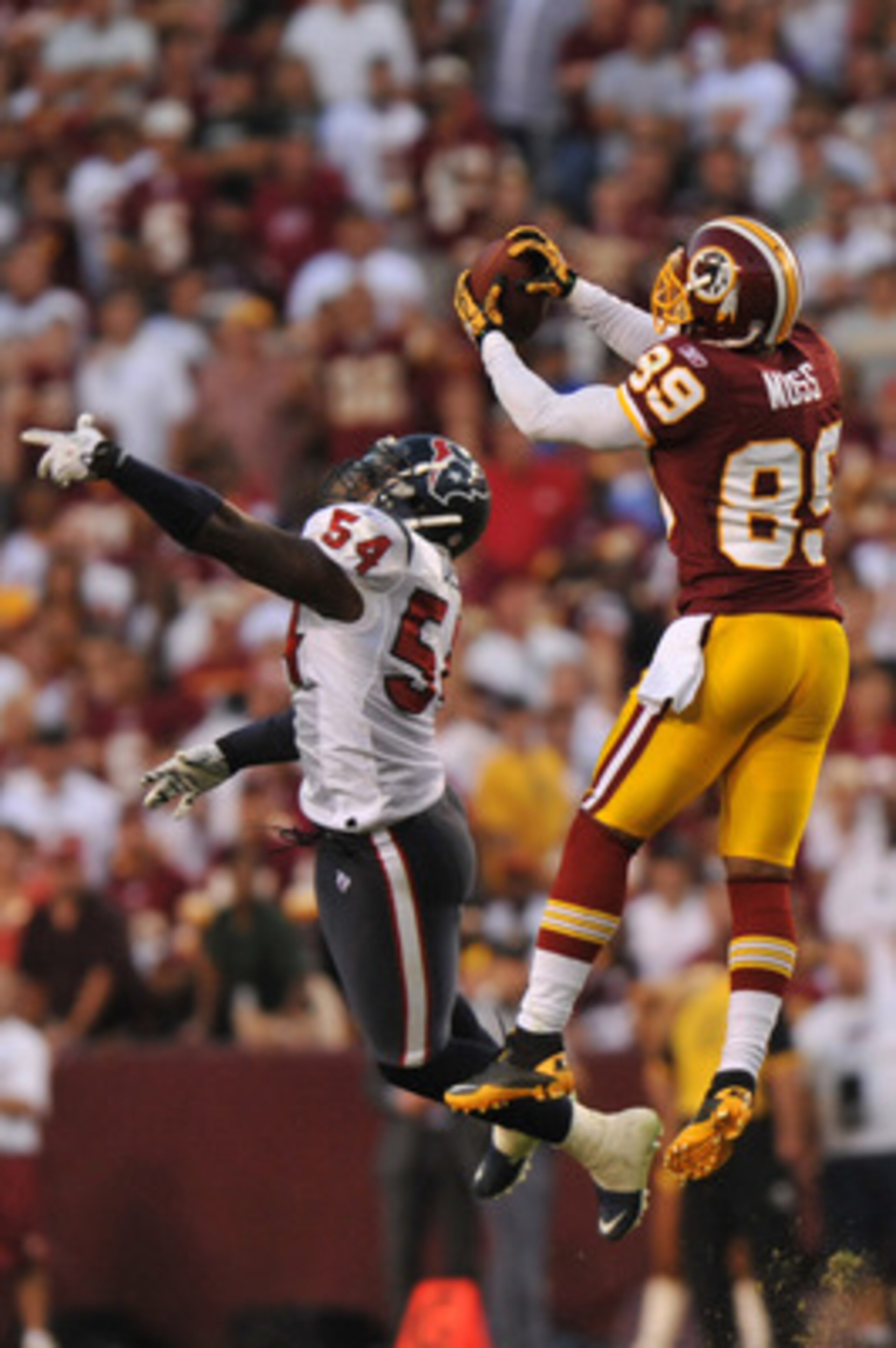 LANDOVER, MD - SEPTEMBER 19: Santana Moss #89 of the Washington Redskins makes a catch against the Houston Texans at FedExField on September 19, 2010 in Landover, Maryland. The Texans defeated the Redskins in overtime 30-27. (Photo by Larry French/Getty LANDOVER, MD - SEPTEMBER 19: Santana Moss #89 of the Washington Redskins makes a catch against the Houston Texans at FedExField on September 19, 2010 in Landover, Maryland. The Texans defeated the Redskins in overtime 30-27. (Photo by Larry French/Getty