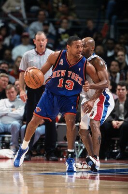 13 Dec 2001:  Point guard Mark Jackson #13 of the New York Knicks posts up point guard Chucky Atkins #7 of the Detroit Pistons during the NBA game at the Palace of Auburn Hills in Detroit, Michigan. The Pistons defeated the Knicks 99-97. NOTE TO USER:  Us