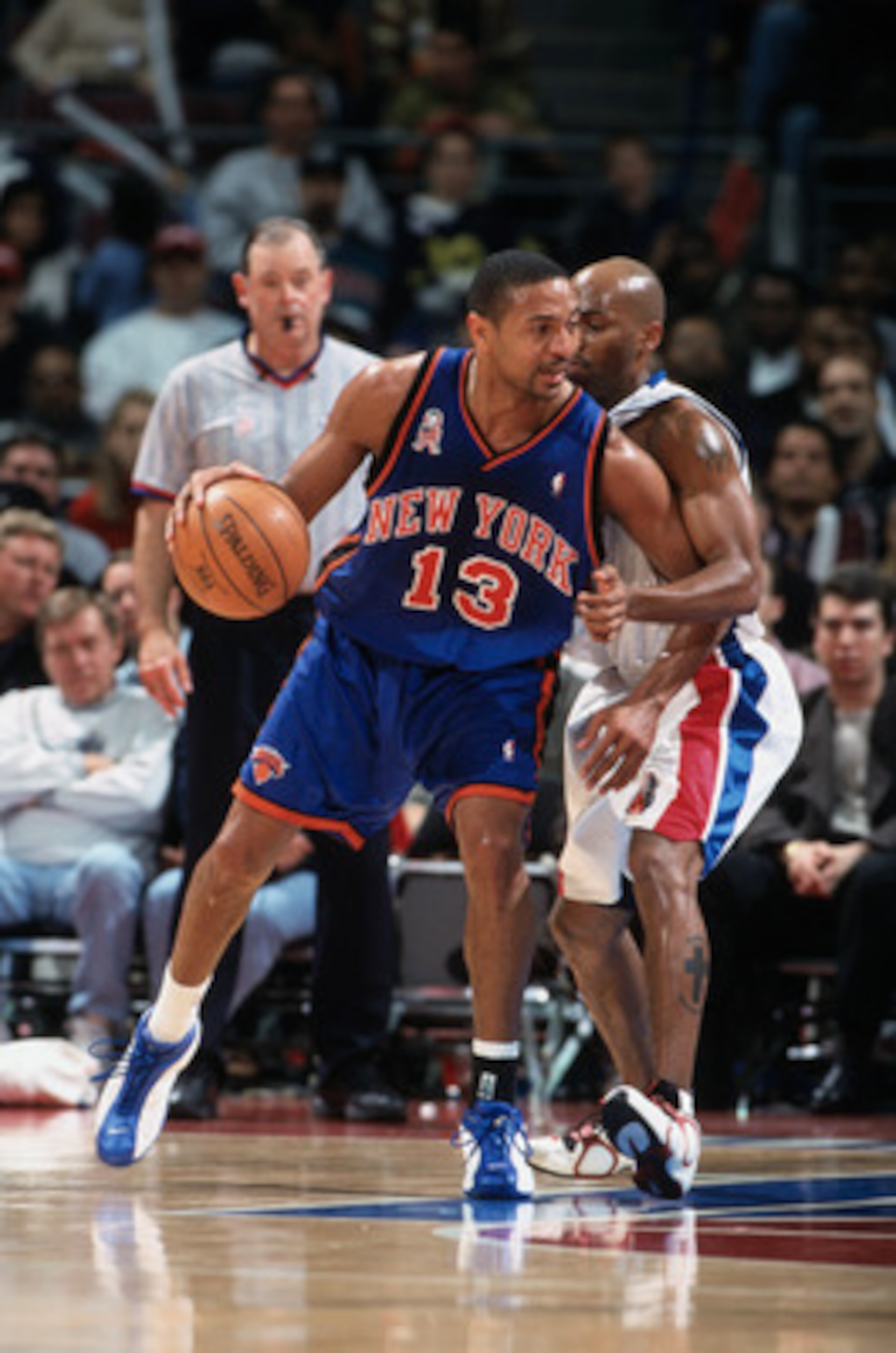 13 Dec 2001:  Point guard Mark Jackson #13 of the New York Knicks posts up point guard Chucky Atkins #7 of the Detroit Pistons during the NBA game at the Palace of Auburn Hills in Detroit, Michigan. The Pistons defeated the Knicks 99-97. NOTE TO USER:  Us