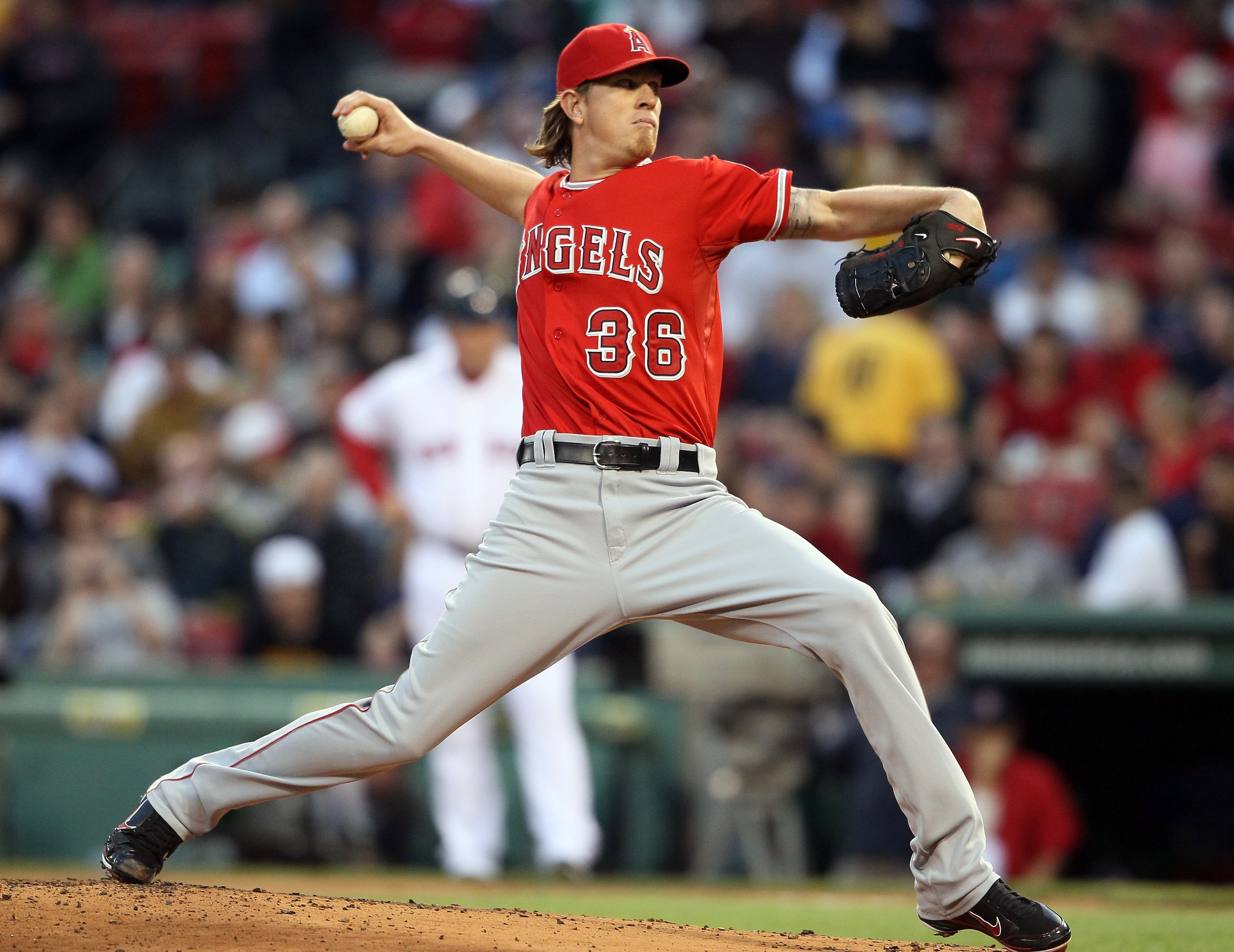 BOSTON, MA - MAY 02:  Jered Weaver #36 of the Los Angeles Angels delivers a pitch in the first inning against the Boston Red Sox on May 2, 2011 at Fenway Park in Boston, Massachusetts.  (Photo by Elsa/Getty Images)