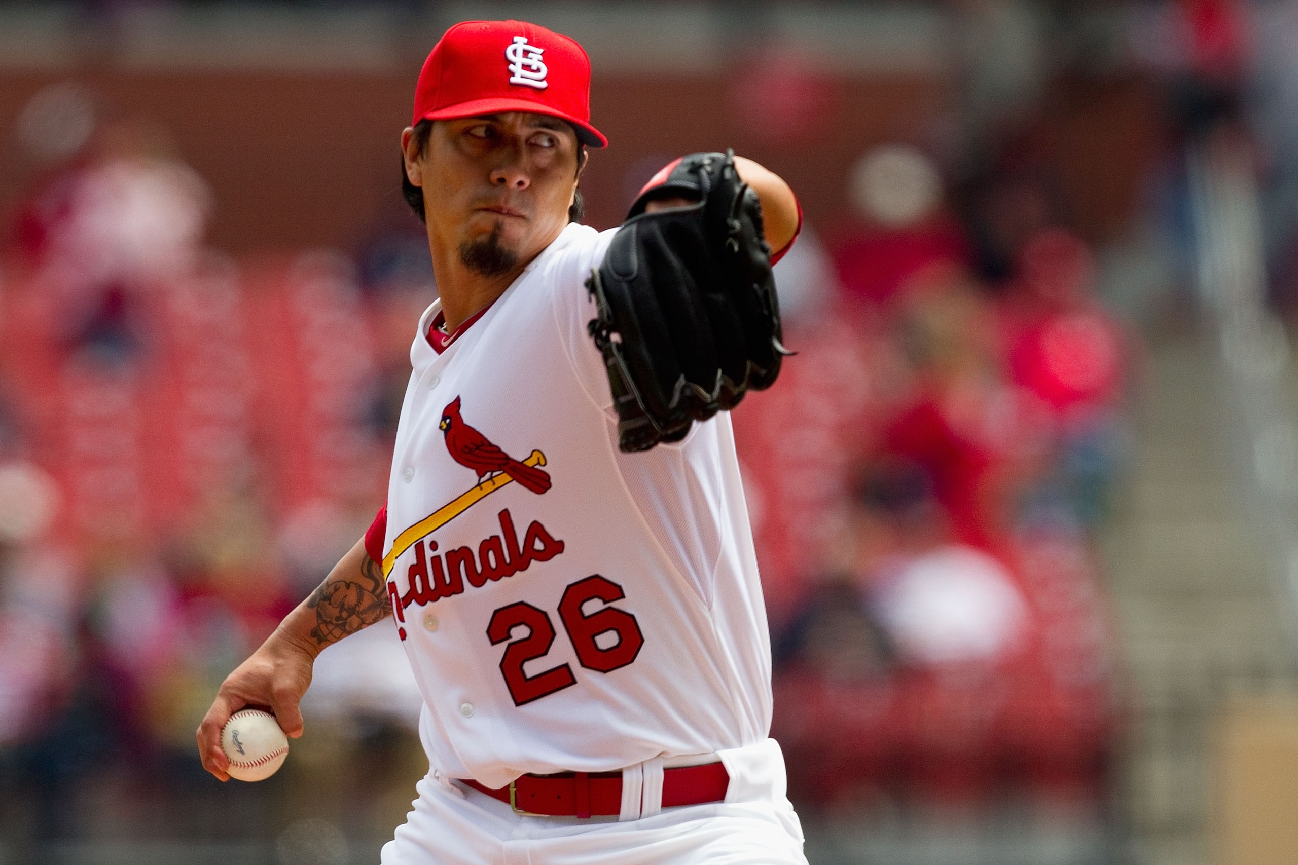 ST. LOUIS, MO - APRIL 21: Starter Kyle Lohse #26 of the St. Louis Cardinals pitches against the Washington Nationals at Busch Stadium on April 21, 2011 in St. Louis, Missouri.  (Photo by Dilip Vishwanat/Getty Images)