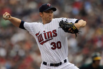 MINNEAPOLIS, MN - APRIL 10: Starting pitcher Scott Baker #30 of the Minnesota Twins throws against the Oakland Athletics during the first inning of a game on April 10, 2011 at Target Field in Minneapolis, Minnesota. (Photo by Hannah Foslien/Getty Images)