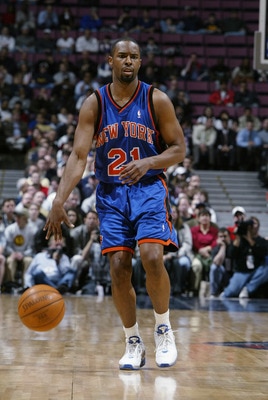 EAST RUTHERFORD, NJ - MARCH 26:  Charlie Ward #21 of the New York Knicks brings the ball forward during the NBA game against the New Jersey Nets at Continental Airlines Arena on March 26, 2003 in East Rutherford, New Jersey.  The Nets won 101-95.  NOTE TO