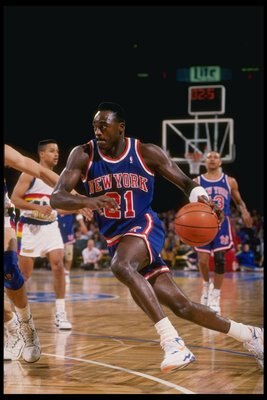 1990-1991:  Guard Gerald Wilkins of the New York Knicks in action during a game against the Denver Nuggets at the McNichols Arena in Denver, Colorado. Mandatory Credit: Tim de Frisco  /Allsport