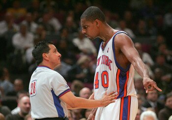 NEW YORK - NOVEMBER 23:  Kurt Thomas #40 of the New York Knicks speaks with referee Tom Nunez #28 while playing against the Atlanta Hawks on November 23, 2004 at Madison Square Garden in New York City.  The Knicks defeated the Hawks 104-88.  NOTE TO USER: