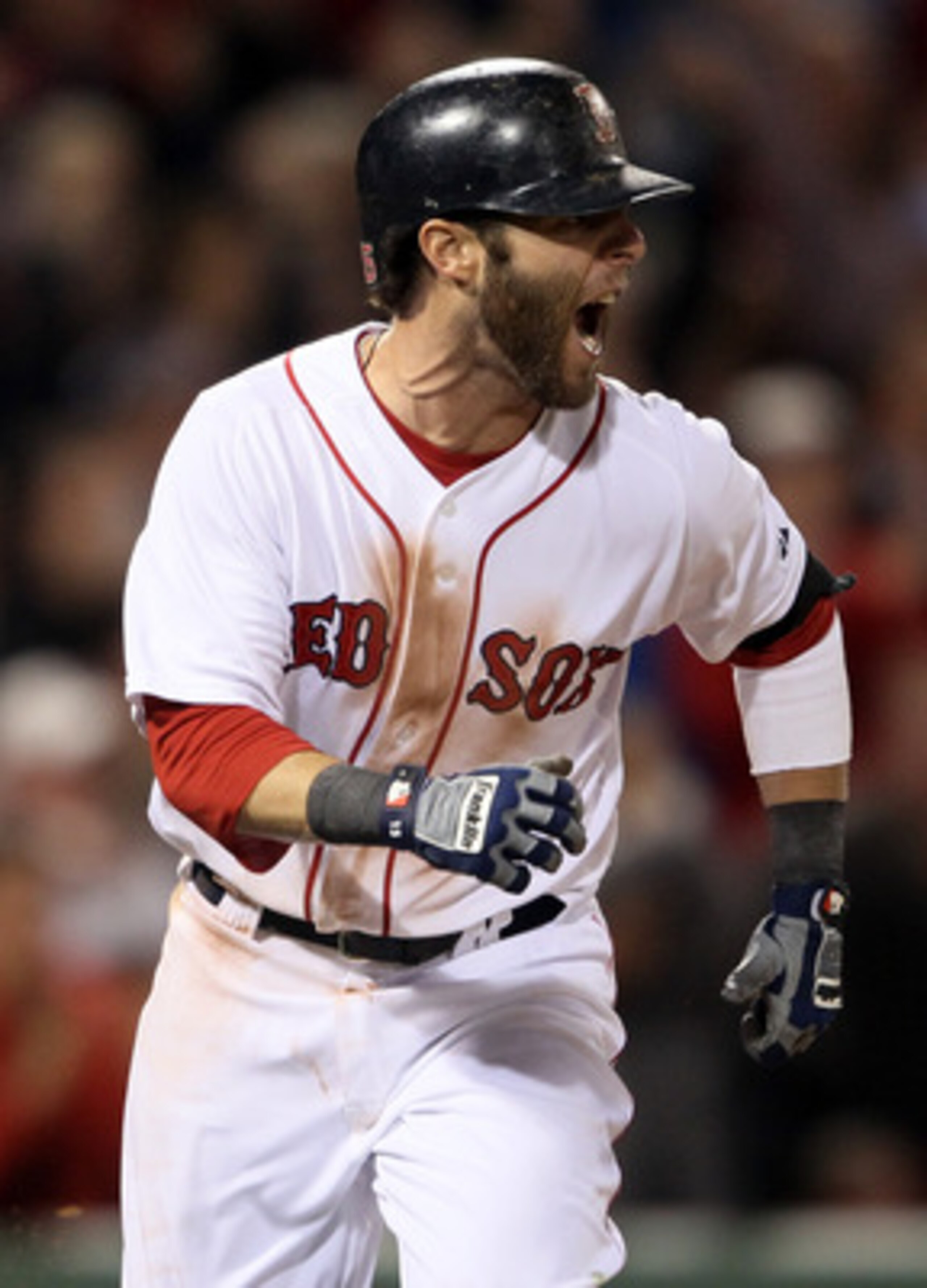 BOSTON, MA - MAY 02:  Dustin Pedroia #15 of the Boston Red Sox celebrates his 2RBI single in the fifth inning against the Los Angeles Angels on May 2, 2011 at Fenway Park in Boston, Massachusetts.  (Photo by Elsa/Getty Images)