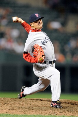 BALTIMORE - SEPTEMBER 02:  Hideki Okajima #37 of the Boston Red Sox pitches against the Baltimore Orioles at Camden Yards on September 2, 2010 in Baltimore, Maryland.  (Photo by Greg Fiume/Getty Images)
