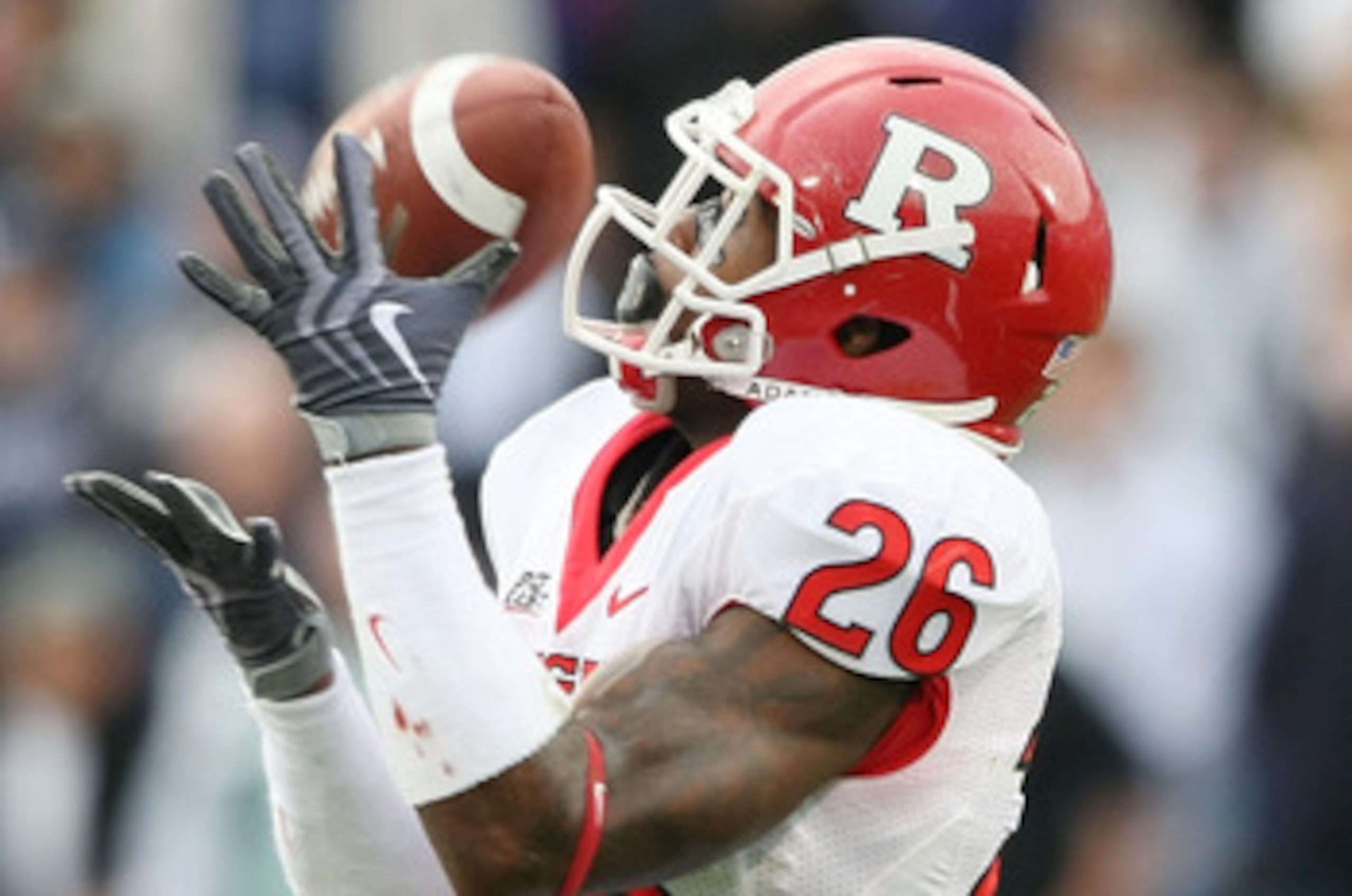 EAST HARTFORD, CT - OCTOBER 31:  Joe Lefeged #26 of the Rutgers Scarlet Knights returns a punt in the second half against the Connecticut Huskies on October 31, 2009 at Rentschler Field in East Hartford, Connecticut. Rutgers defeated Connecticut 28-24.  (