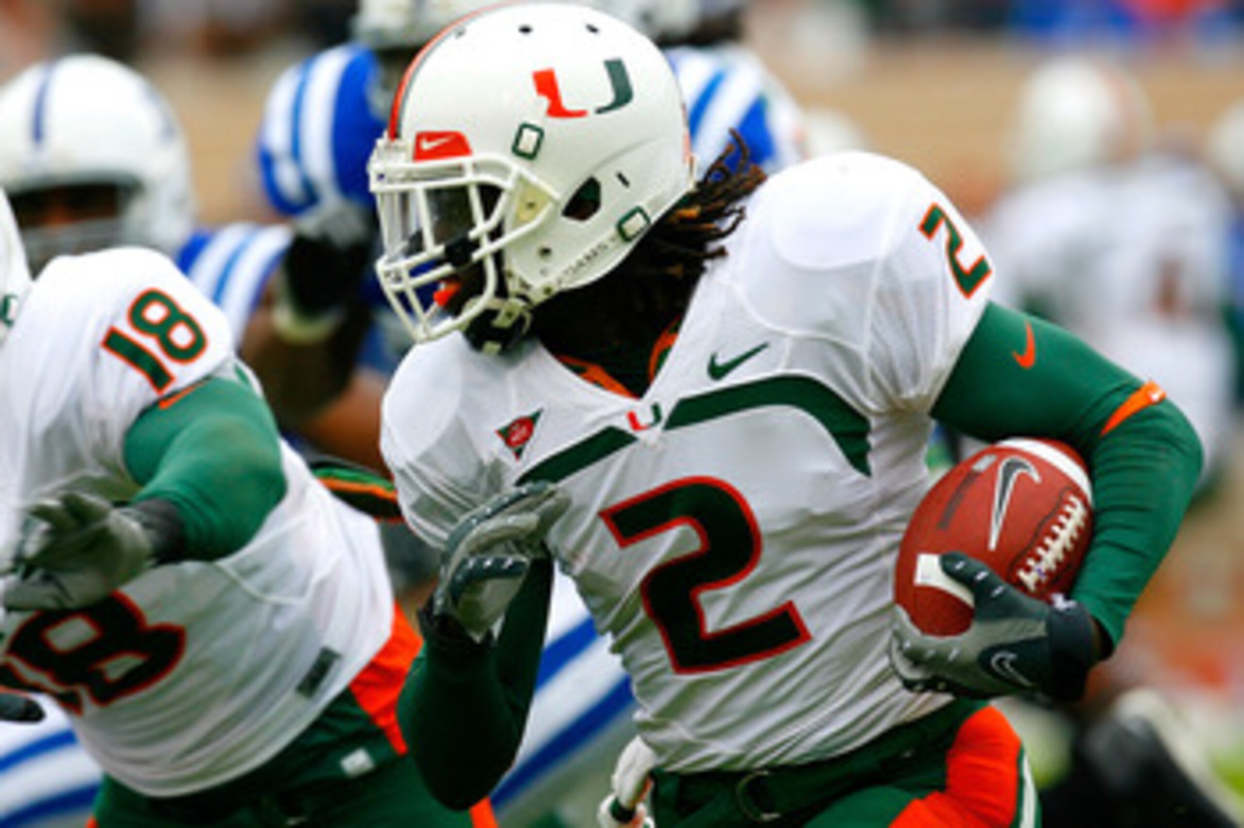 DURHAM, NC - OCTOBER 18:  Running back Graig Cooper #2 of the Miami Hurricanes rushes upfield against the Duke Blue Devils during the game at Wallace Wade Stadium on October 18, 2008 in Durham, North Carolina.  (Photo by Kevin C. Cox/Getty Images)