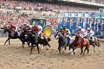 ELMONT, NY - JUNE 07:  Big Brown (R) ridden by jockey Kent Desormeaux and the field come out of the gate to start the 140th running of the Belmont Stakes at Belmont Park on June 7, 2008 in Elmont, New York.  (Photo by Al Bello/Getty Images)