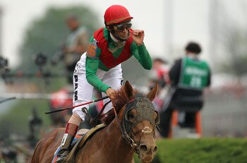 LOUISVILLE, KY - MAY 07:  Jockey John Valazquez, riding Animal Kingdom #16, celebrates winning the 137th Kentucky Derby at Churchill Downs on May 7, 2011 in Louisville, Kentucky.  (Photo by Al Bello/Getty Images)