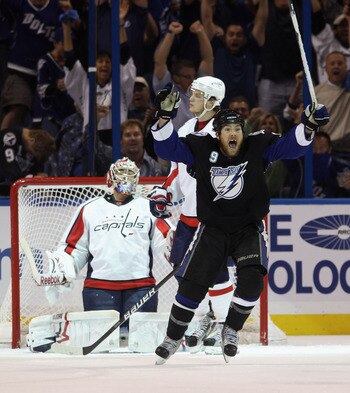 TAMPA, FL - MAY 04:  Steve Downie #9 of the Tampa Bay Lightning celebrates the game winning goal by Marc-Andre Bergeron #47 at 5:07 of the third period against the Washington Capitals  in Game Four of the Eastern Conference Semifinals during the 2011 NHL