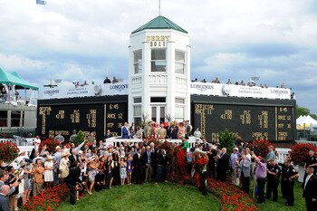 LOUISVILLE, KY - MAY 07:  Jockey John Valazquez, riding Animal Kingdom #16, celebrates with the roses winning the 137th Kentucky Derby at Churchill Downs on May 7, 2011 in Louisville, Kentucky.  (Photo by Harry How/Getty Images)