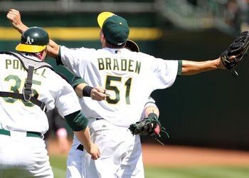 OAKLAND, CA - MAY 09:  Dallas Braden #51 of the Oakland Athletics celebrates after pitching a perfect game against the Tampa Bay Rays during an MLB game at the Oakland-Alameda County Coliseum on May 9, 2010 in Oakland, California.  (Photo by Jed Jacobsohn