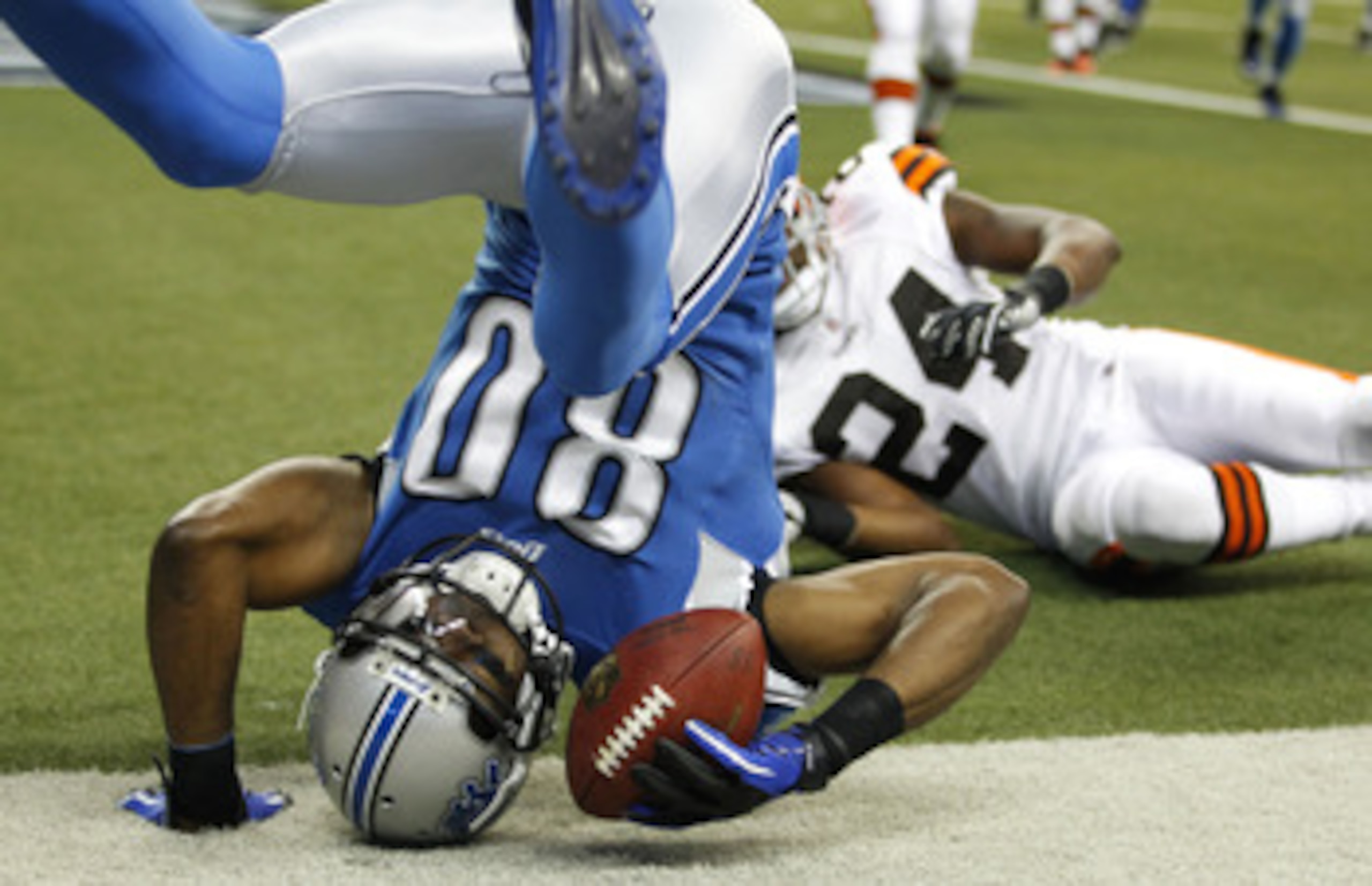 DETROIT - AUGUST 28: Bryant Johnson #80 of the Detroit Lions scores a first quarter touchdown behind Sheldon Brown #24 of the Cleveland Browns during a preseason game on August 28, 2010 at Ford Field in Detroit, Michigan. (Photo by Gregory Shamus/Getty DETROIT - AUGUST 28: Bryant Johnson #80 of the Detroit Lions scores a first quarter touchdown behind Sheldon Brown #24 of the Cleveland Browns during a preseason game on August 28, 2010 at Ford Field in Detroit, Michigan. (Photo by Gregory Shamus/Getty