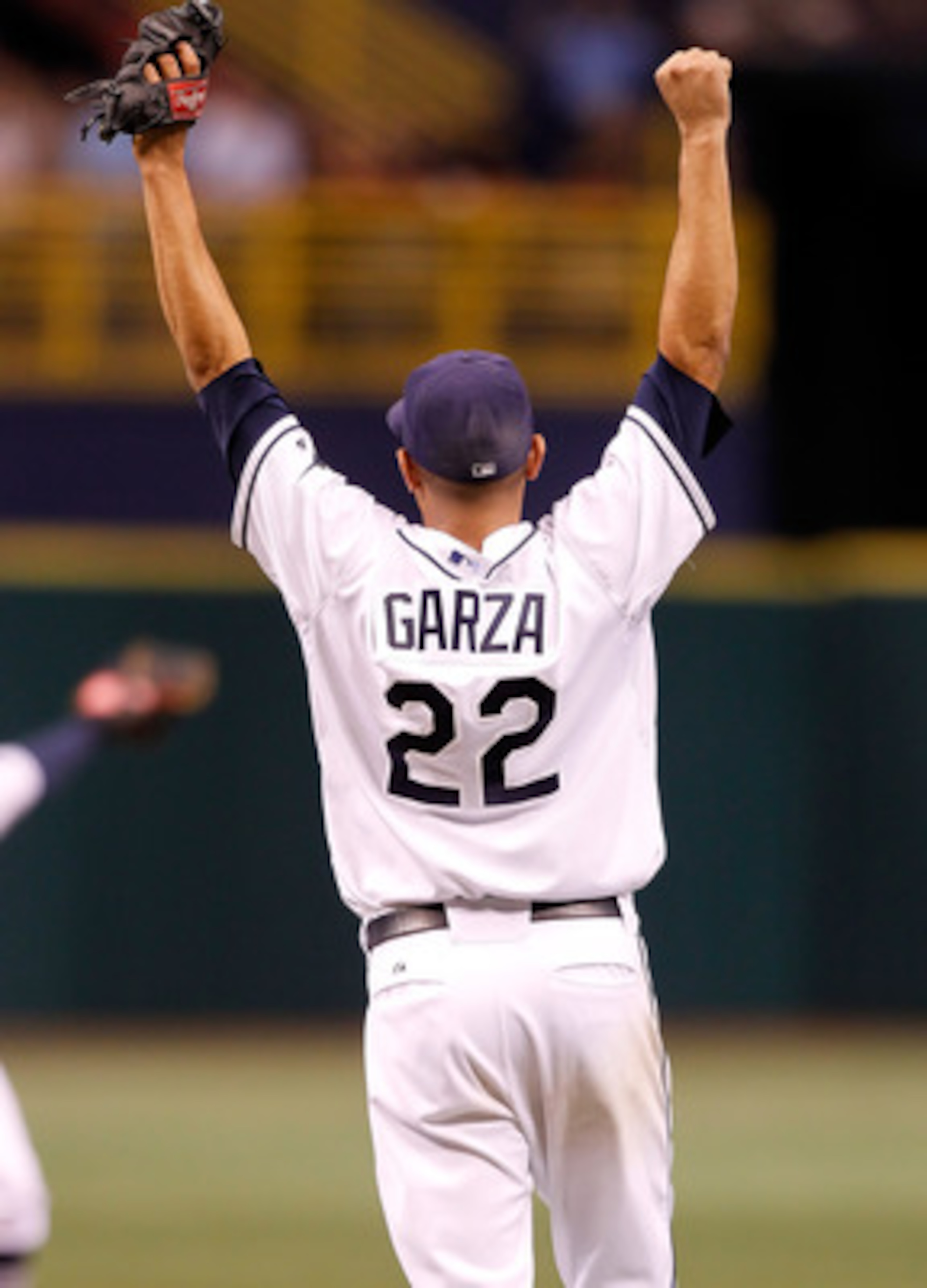 ST PETERSBURG, FL - JULY 26:  Pitcher Matt Garza #22 of the Tampa Bay Rays celebrates his no hitter against the Detroit Tigers during the game at Tropicana Field on July 26, 2010 in St. Petersburg, Florida. Tampa Bay beat Detroit 5-0.  (Photo by J. Meric/