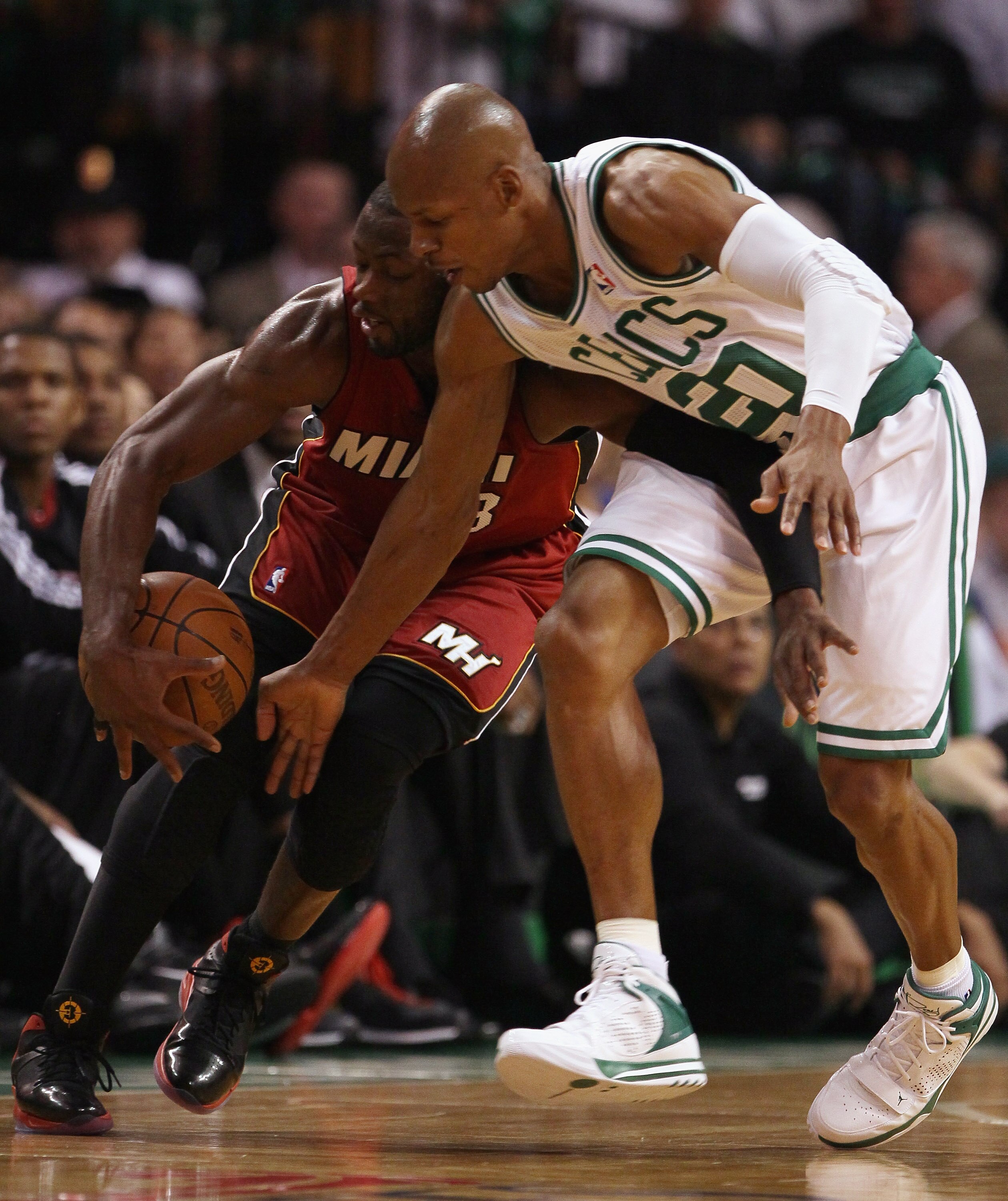 BOSTON, MA - MAY 07: Ray Allen #20 of the Boston Celtics tries to steal the ball from Dwyane Wade #3 of the Miami Heat in Game Three of the Eastern Conference Semifinals in the 2011 NBA Playoffs on May 7, 2011 at the TD Garden in Boston, Massachusetts.  N