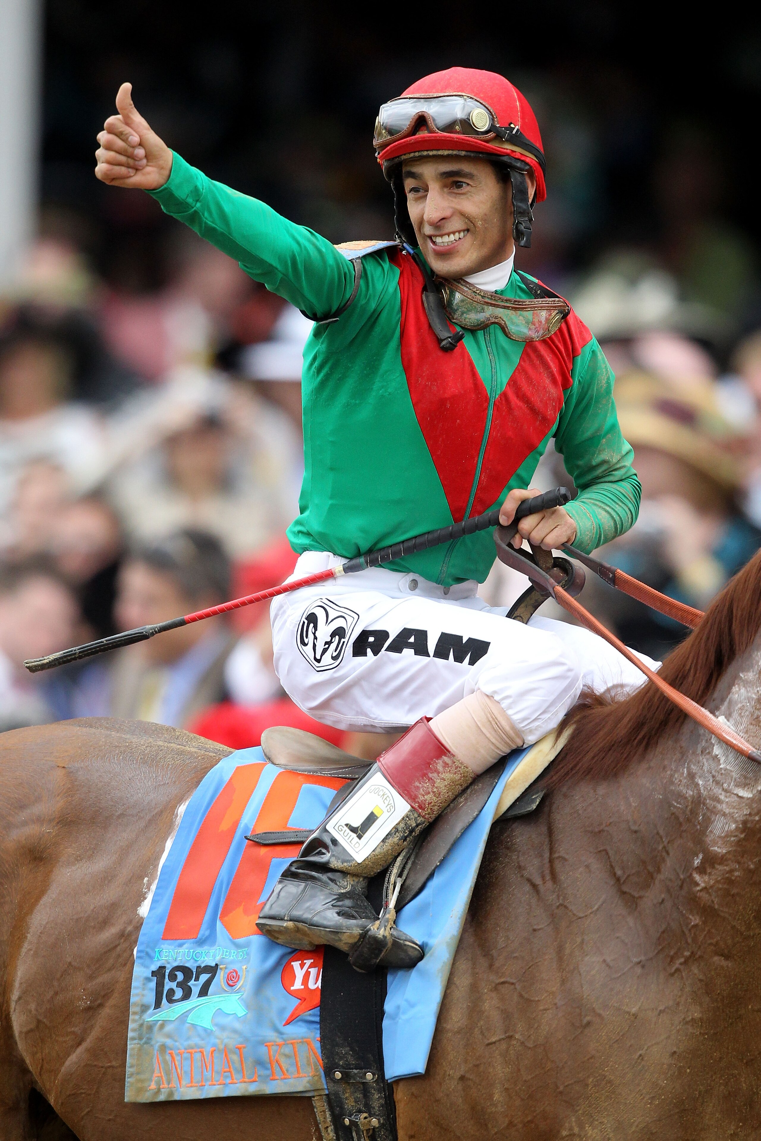 LOUISVILLE, KY - MAY 07:  Jockey John Velazquez, riding Animal Kingdom #16, celebrates winning the 137th Kentucky Derby at Churchill Downs on May 7, 2011 in Louisville, Kentucky.  (Photo by Matthew Stockman/Getty Images)