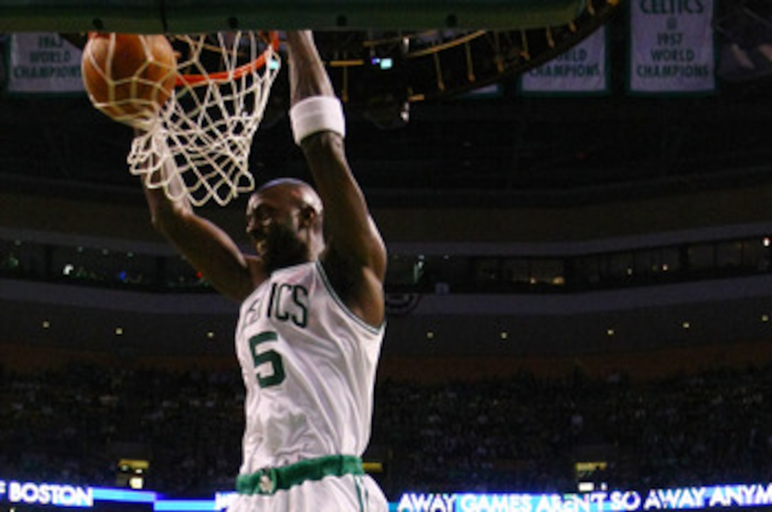 BOSTON, MA - MAY 07: Kevin Garnett #5 of the Boston Celtics dunks the ball as Mike Bibby #0 of the Miami Heat defends in Game Three of the Eastern Conference Semifinals in the 2011 NBA Playoffs on May 7, 2011 at the TD Garden in Boston, Massachusetts. NO BOSTON, MA - MAY 07: Kevin Garnett #5 of the Boston Celtics dunks the ball as Mike Bibby #0 of the Miami Heat defends in Game Three of the Eastern Conference Semifinals in the 2011 NBA Playoffs on May 7, 2011 at the TD Garden in Boston, Massachusetts. NO