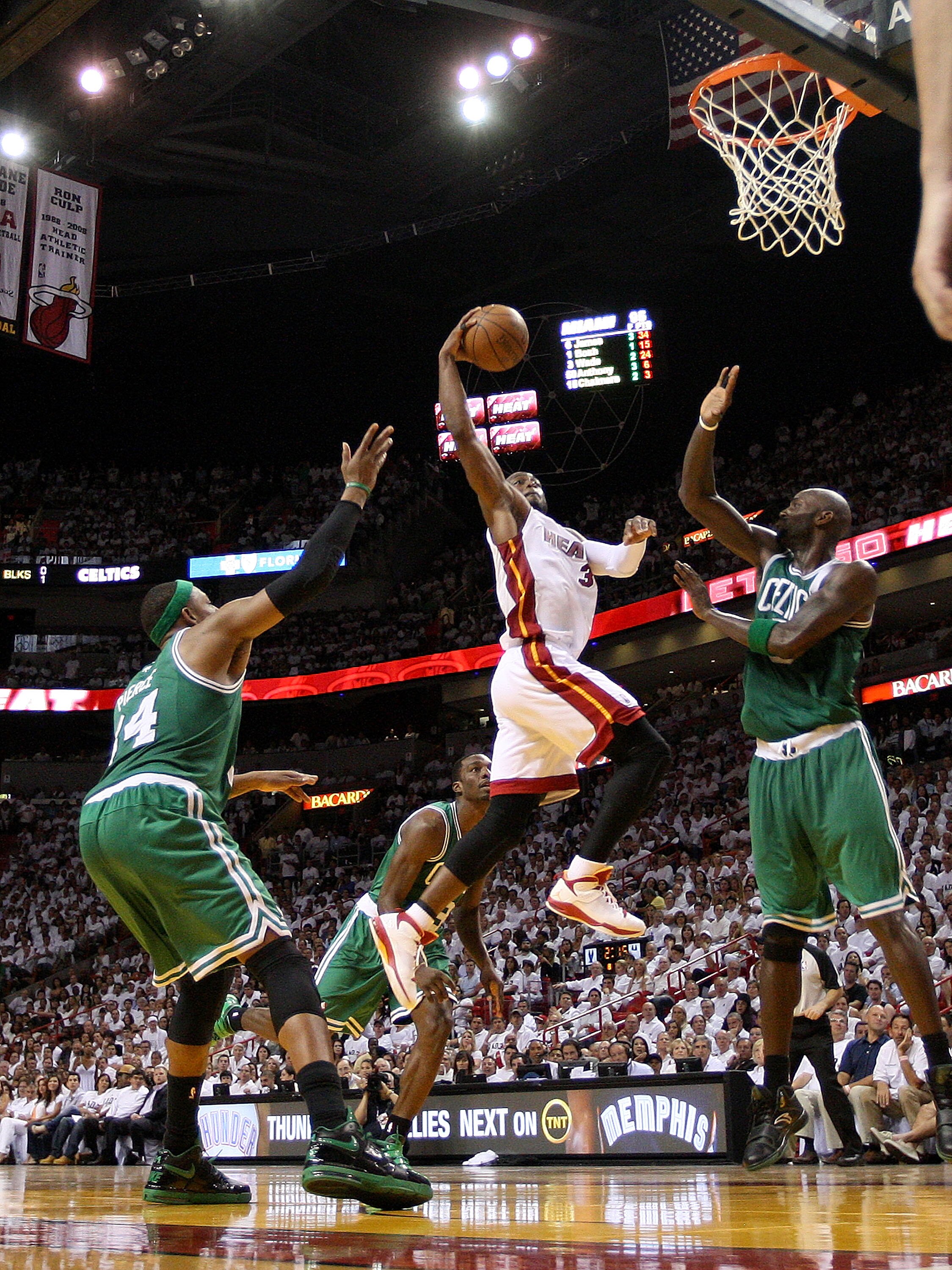 MIAMI, FL - MAY 03:  Dwyane Wade #3 of the Miami Heat drives against Kevin Garnett #5 of the Boston Celtics during Game Two of the Eastern Conference Semifinals of the 2011 NBA Playoffs at American Airlines Arena on May 3, 2011 in Miami, Florida. NOTE TO 