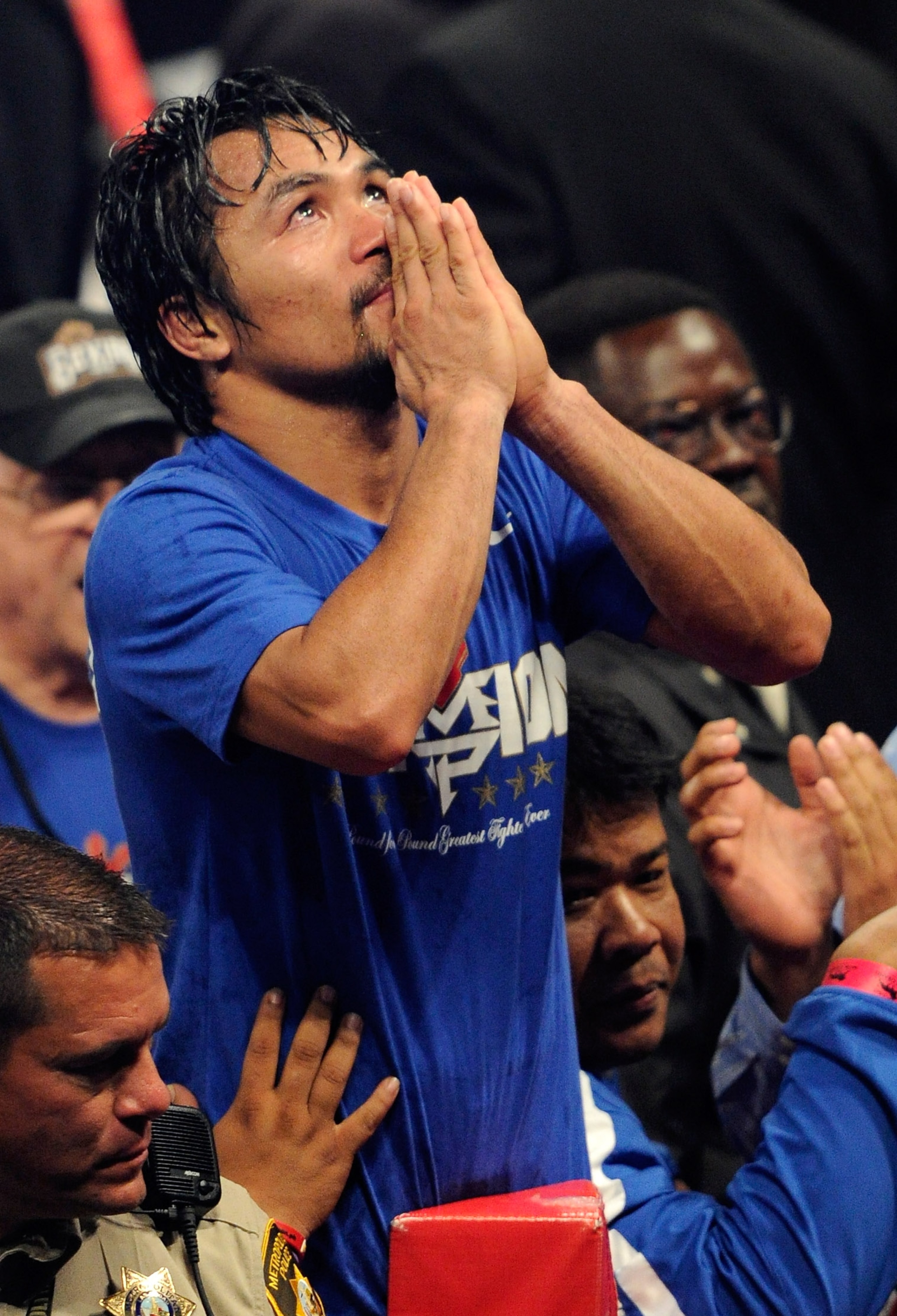 LAS VEGAS, NV - MAY 07:  Manny Pacquiao of the Philippines celebrates after his unanimous decision victory against Shane Mosley in the WBO welterweight title fight at MGM Grand Garden Arena on May 7, 2011 in Las Vegas, Nevada.  (Photo by Ethan Miller/Gett