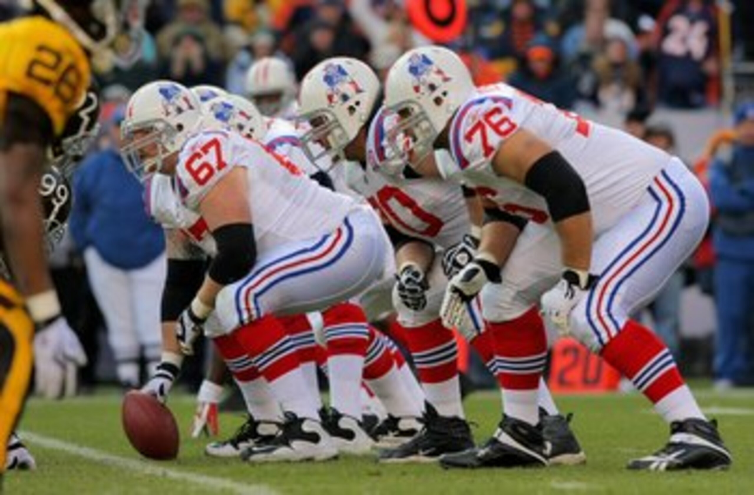 DENVER - OCTOBER 11: Center Dan Koppen #67 of the New England Patriots prepares to snap the ball as the offensive line readies for pass protection against the Denver Broncos during NFL action at Invesco Field at Mile High on October 11, 2009 in Denver, C DENVER - OCTOBER 11: Center Dan Koppen #67 of the New England Patriots prepares to snap the ball as the offensive line readies for pass protection against the Denver Broncos during NFL action at Invesco Field at Mile High on October 11, 2009 in Denver, C