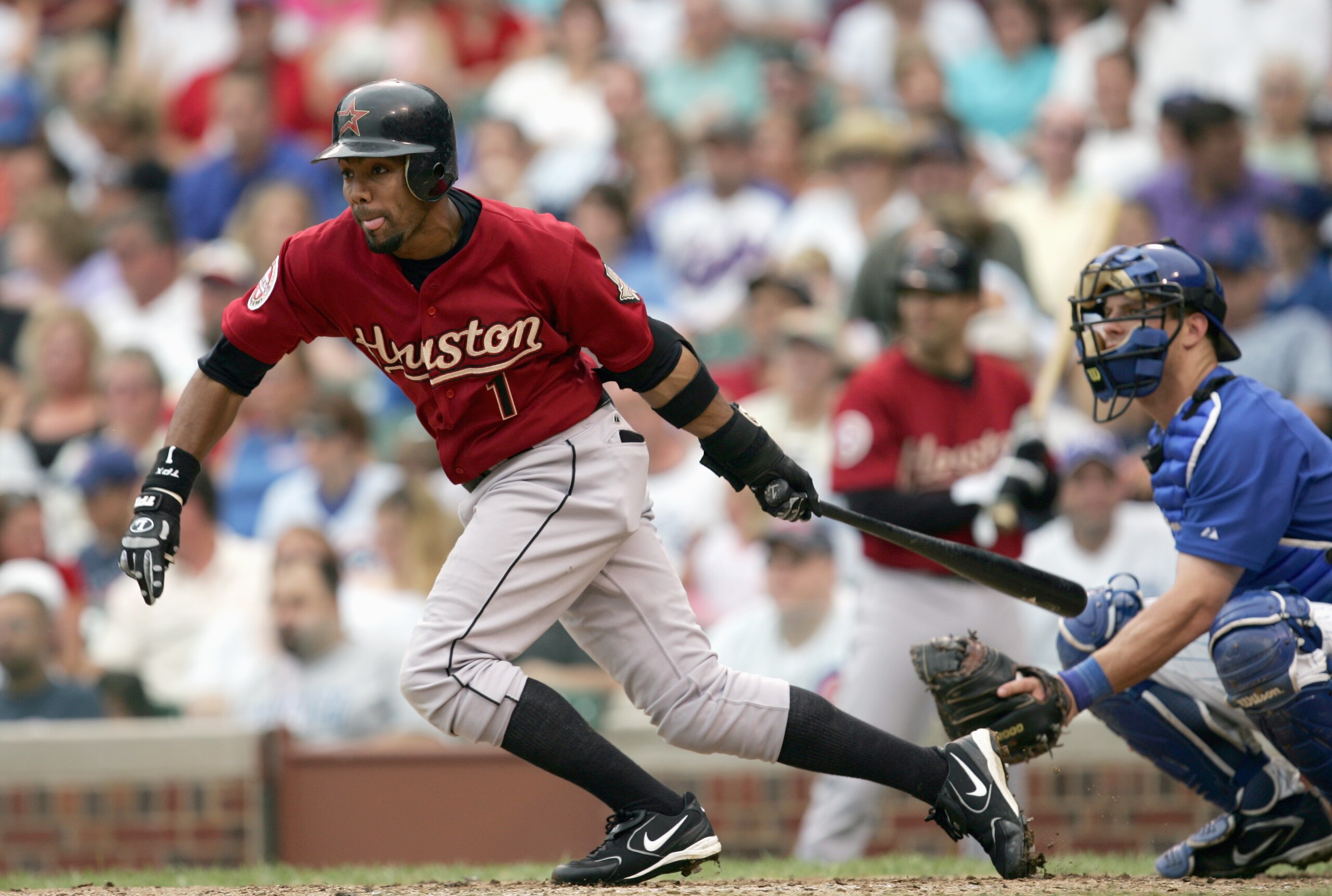 CHICAGO - JULY 20:  Willy Taveras #1 of the Houston Astros makes a hit during the game against the Chicago Cubs on July 20, 2006 at Wrigley Field in Chicago, Illinois. (Photo by Jonathan Daniel/Getty Images)