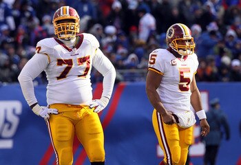 EAST RUTHERFORD, NJ - DECEMBER 05:  Donovan McNabb #5 and Jammal Brown #77 of the Washington Redskins looks on against the New York Giants on December 5, 2010 at the New Meadowlands Stadium in East Rutherford, New Jersey.  (Photo by Jim McIsaac/Getty Imag
