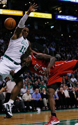 BOSTON - JANUARY 11:  Glen Davis #11 of the Boston Celtics is called for a flagrant foul on Marvin Williams #24 of the Atlanta Hawks at the TD Garden on January 11, 2010 in Boston, Massachusetts. The Hawks defeated the Celtics 102-96. NOTE TO USER: User e