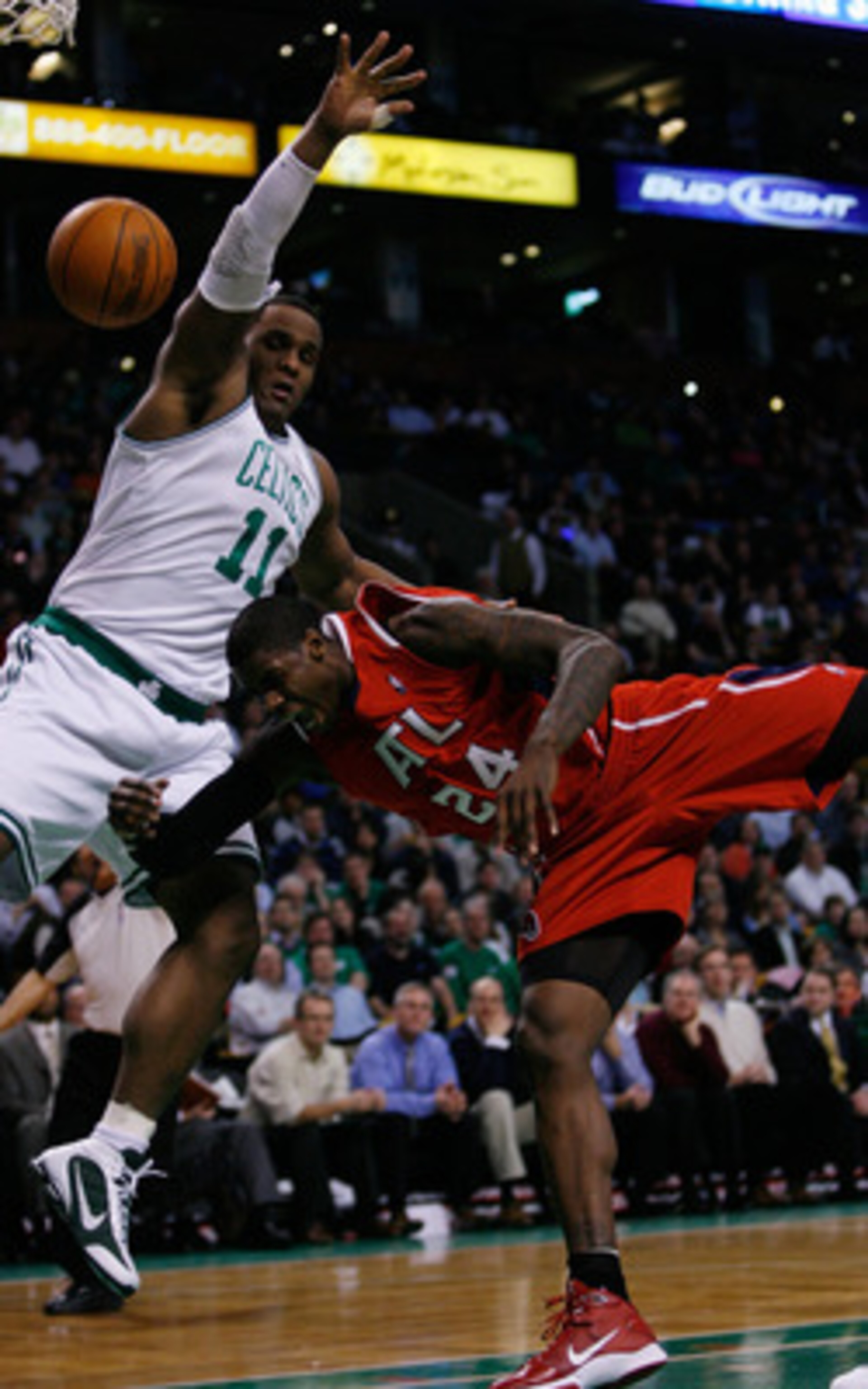 BOSTON - JANUARY 11:  Glen Davis #11 of the Boston Celtics is called for a flagrant foul on Marvin Williams #24 of the Atlanta Hawks at the TD Garden on January 11, 2010 in Boston, Massachusetts. The Hawks defeated the Celtics 102-96. NOTE TO USER: User e