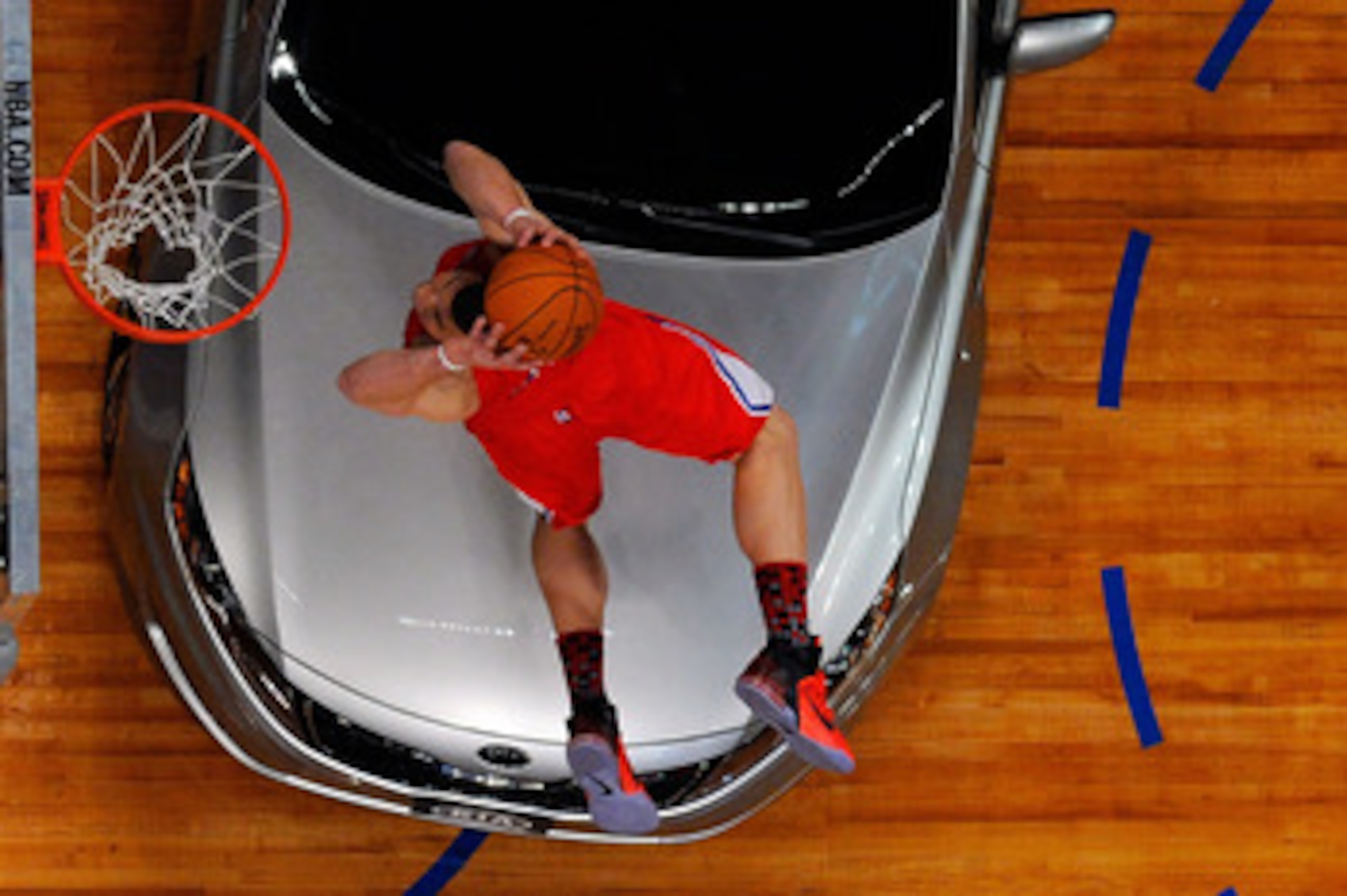 LOS ANGELES, CA - FEBRUARY 19:  Blake Griffin #32 of the Los Angeles Clippers dunks the ball over a car in the final round of the Sprite Slam Dunk Contest apart of NBA All-Star Saturday Night at Staples Center on February 19, 2011 in Los Angeles, Californ