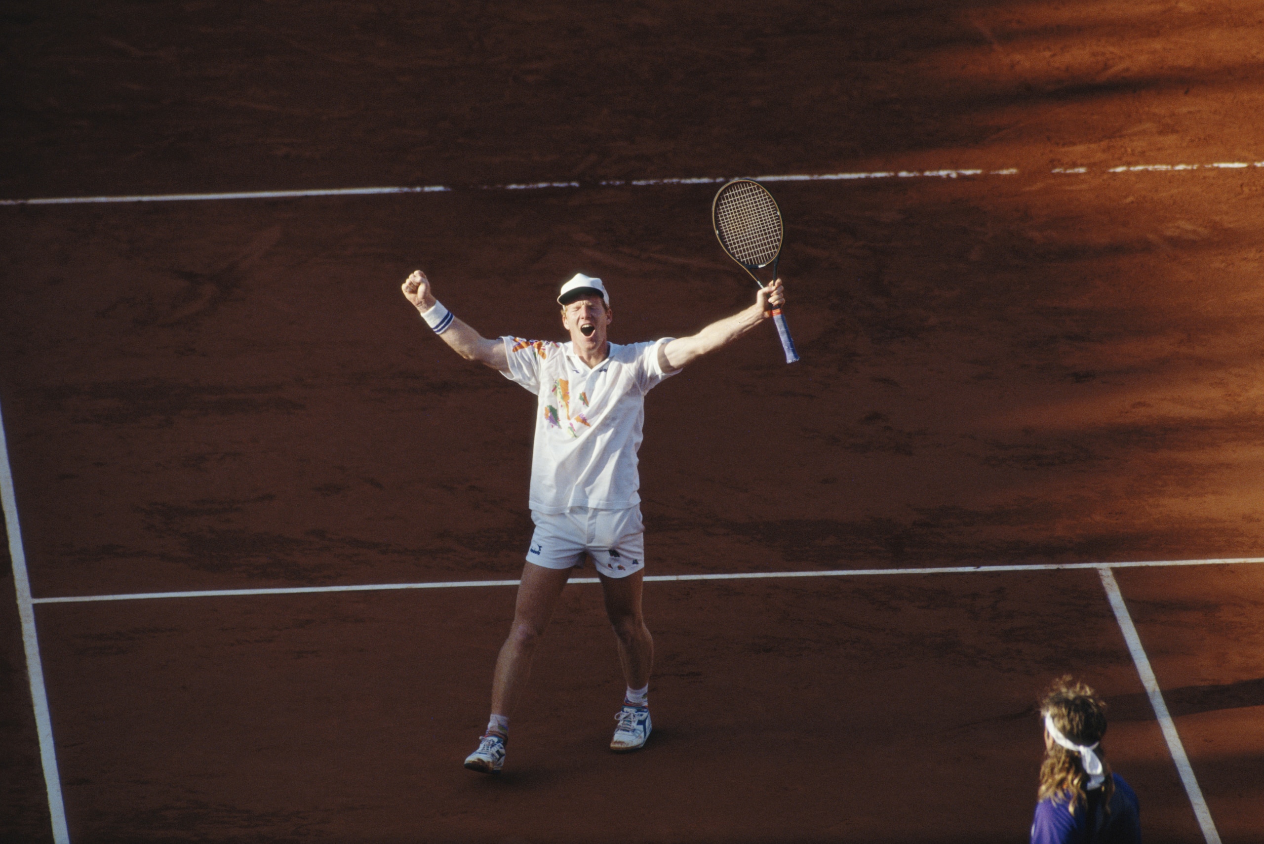 Jim Courier celebrates his defeat of Andre Agassi 3-6 6-4 2-6 6-1 6-4 in the final to win the Men's Singles title at the French Open on 9th June 1991at the Roland Garros stadium in Paris, France. (Photo by Pascal Rondeau/Getty Images)