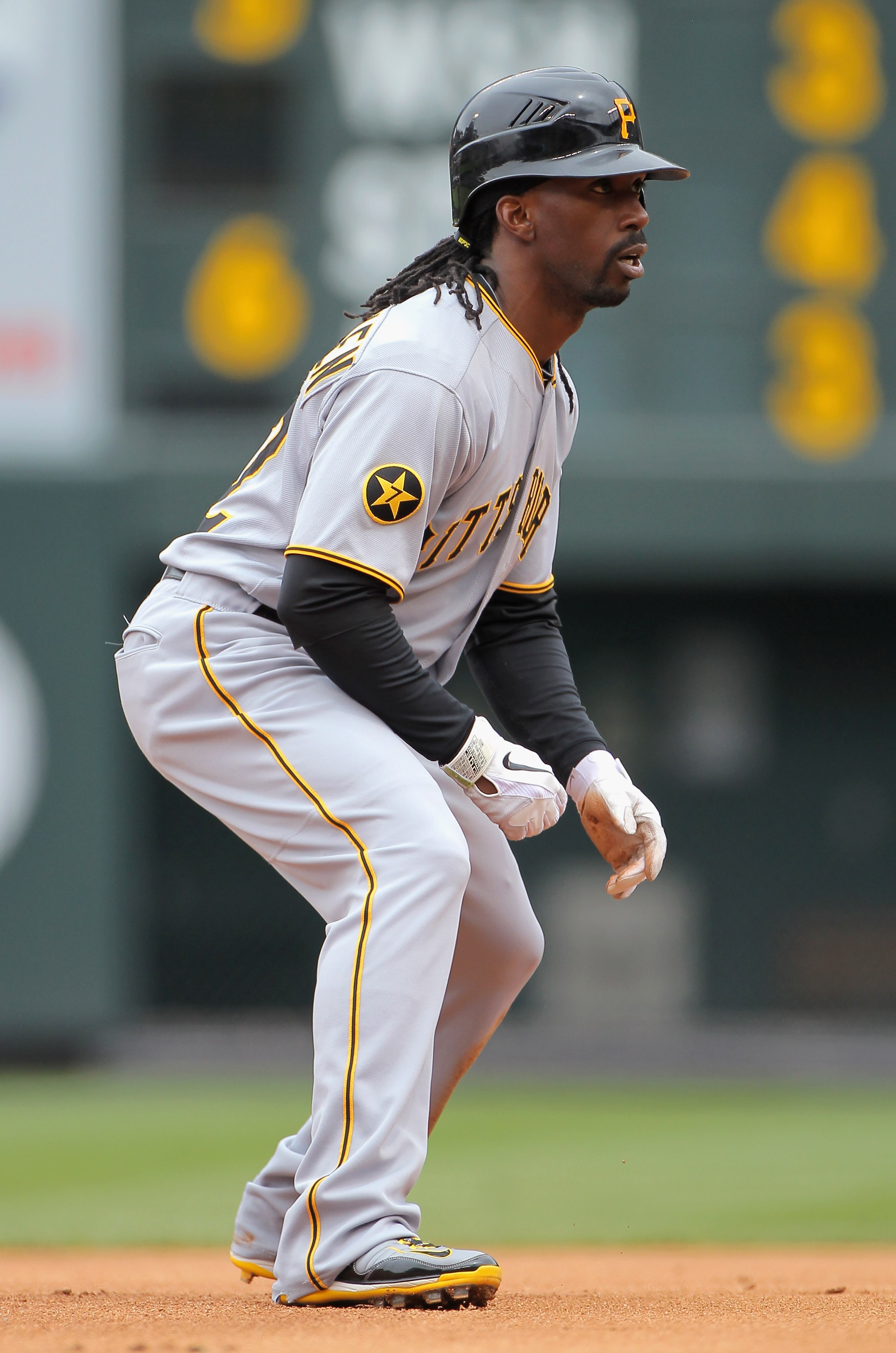 DENVER, CO - MAY 01:  Center fielder Andrew McCutchen #22 of the Pittsburgh Pirates leads off second base against the Colorado Rockies at Coors Field on May 1, 2011 in Denver, Colorado. The Pirates defeated the Rockies 8-4.  (Photo by Doug Pensinger/Getty
