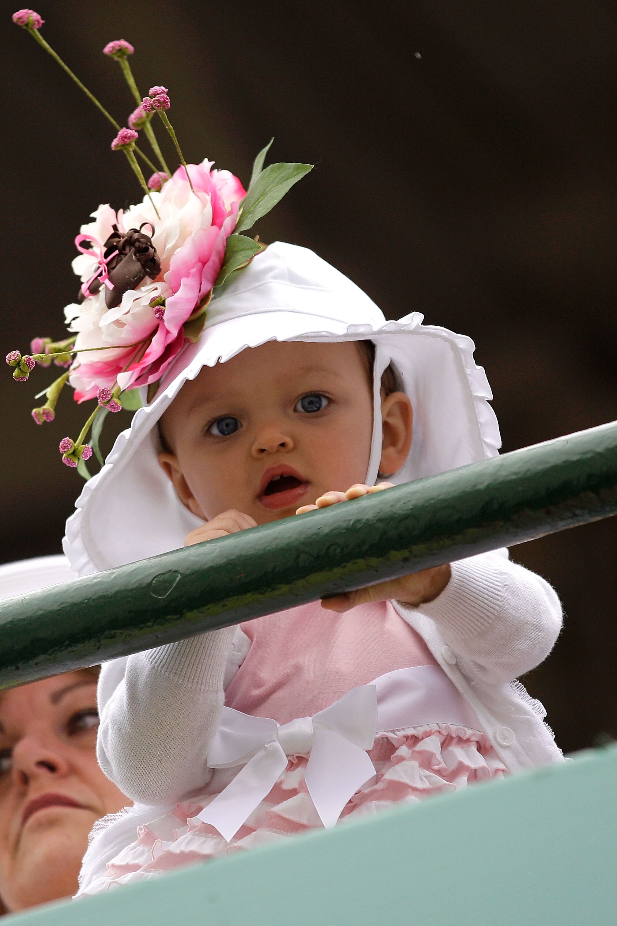LOUISVILLE, KY - MAY 07:  A baby looks on from the grandstands during the 137th Kentucky Derby at Churchill Downs on May 7, 2011 in Louisville, Kentucky.  (Photo by Rob Carr/Getty Images)