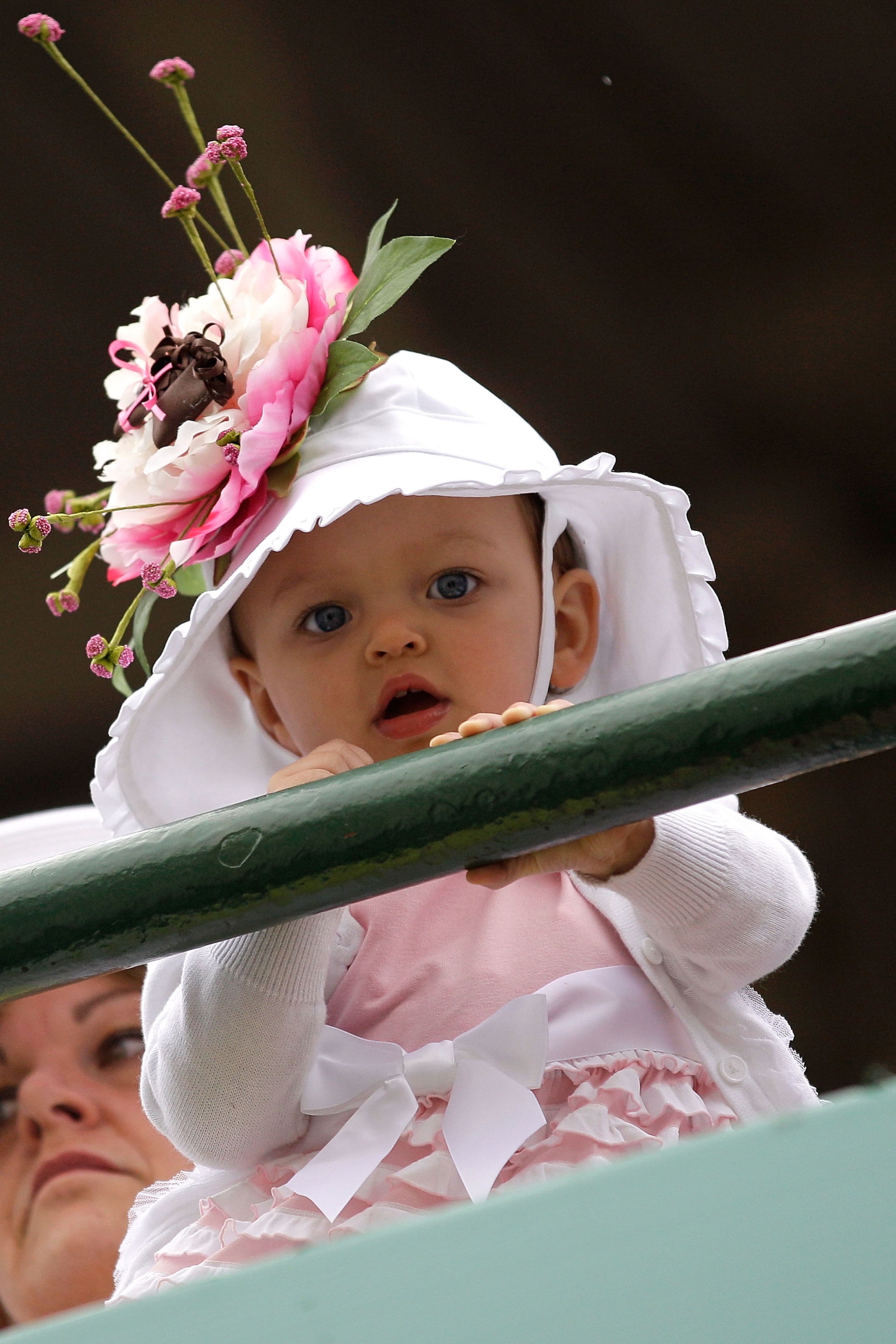 LOUISVILLE, KY - MAY 07:  A baby looks on from the grandstands during the 137th Kentucky Derby at Churchill Downs on May 7, 2011 in Louisville, Kentucky.  (Photo by Rob Carr/Getty Images)