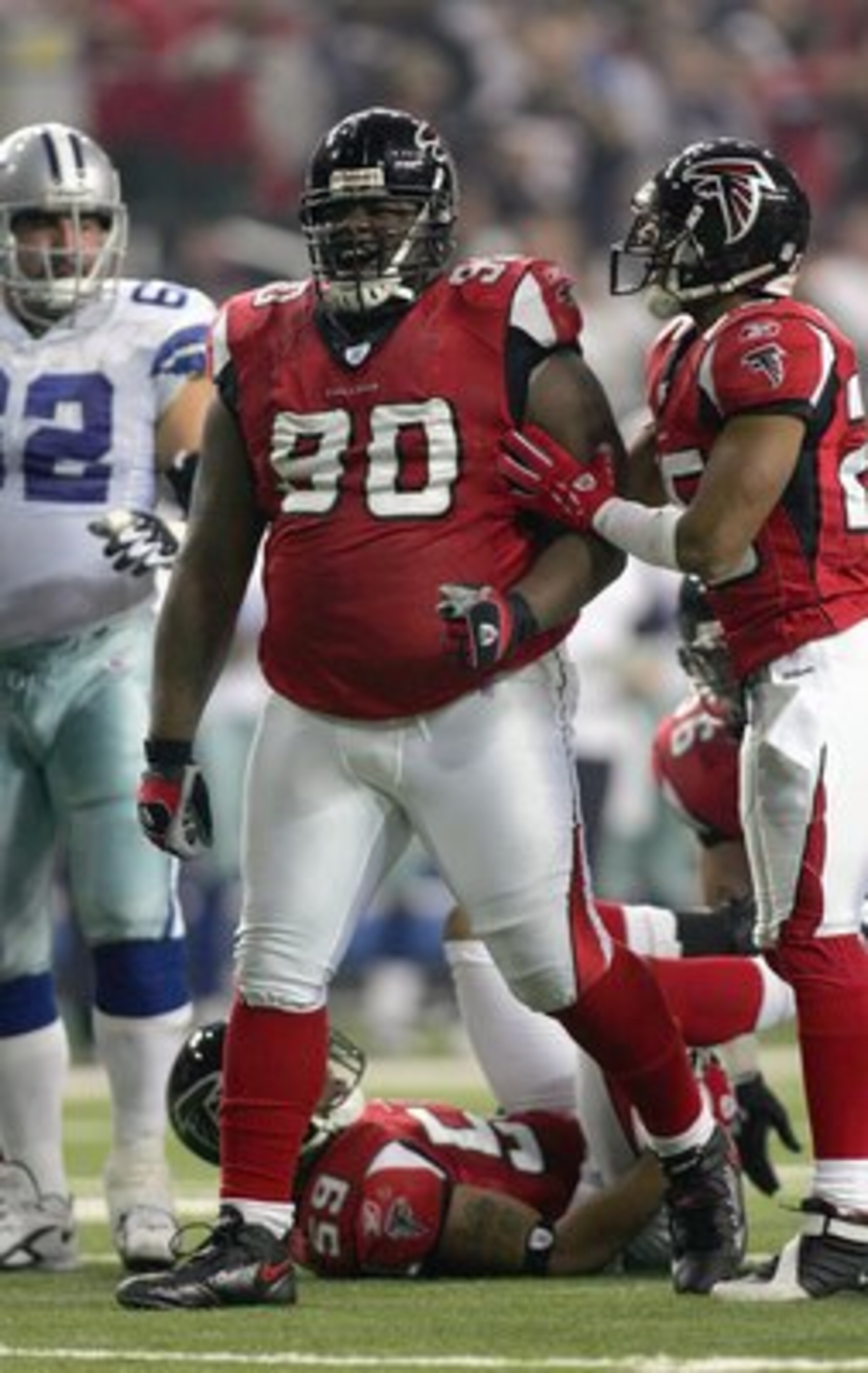 ATLANTA - DECEMBER 16: Grady Jackson #90 of the Atlanta Falcons celebrates during a game against the Dallas Cowboys at the Georgia Dome on December 16, 2006 in Atlanta, Georgia. (Photo by Ronald Martinez/Getty Images)